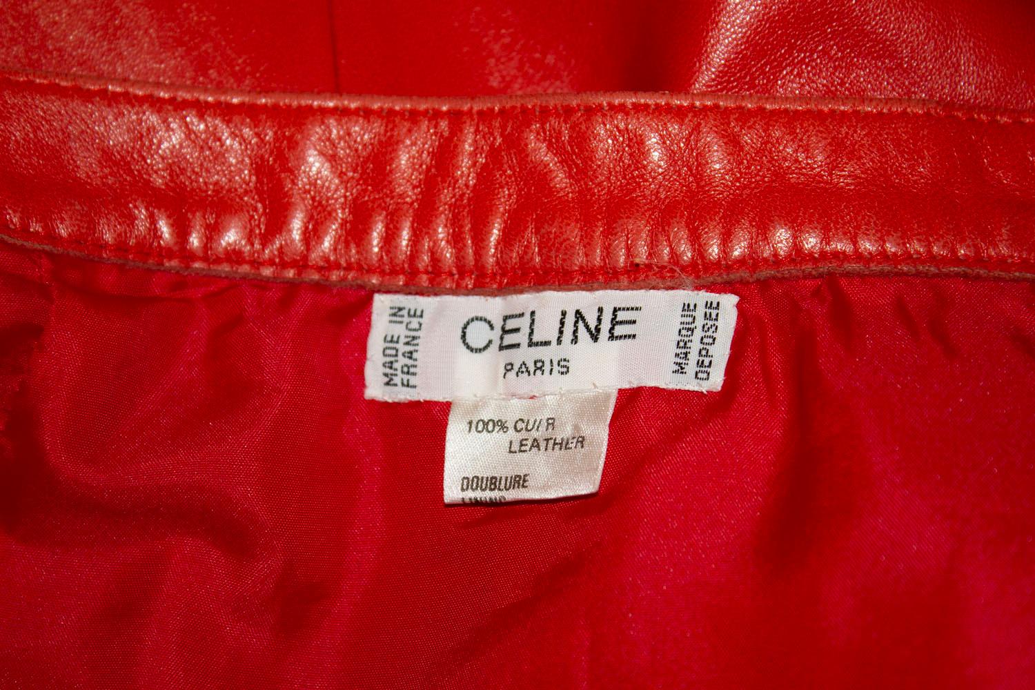 A wonderful vintage leather skirt by Celine.
The skirt was made in France and has all the original Celine popper fastenings.
It is A line  and fully lined. it has some small biro marks that may come off.
Measurements waist 27'',length 28''
