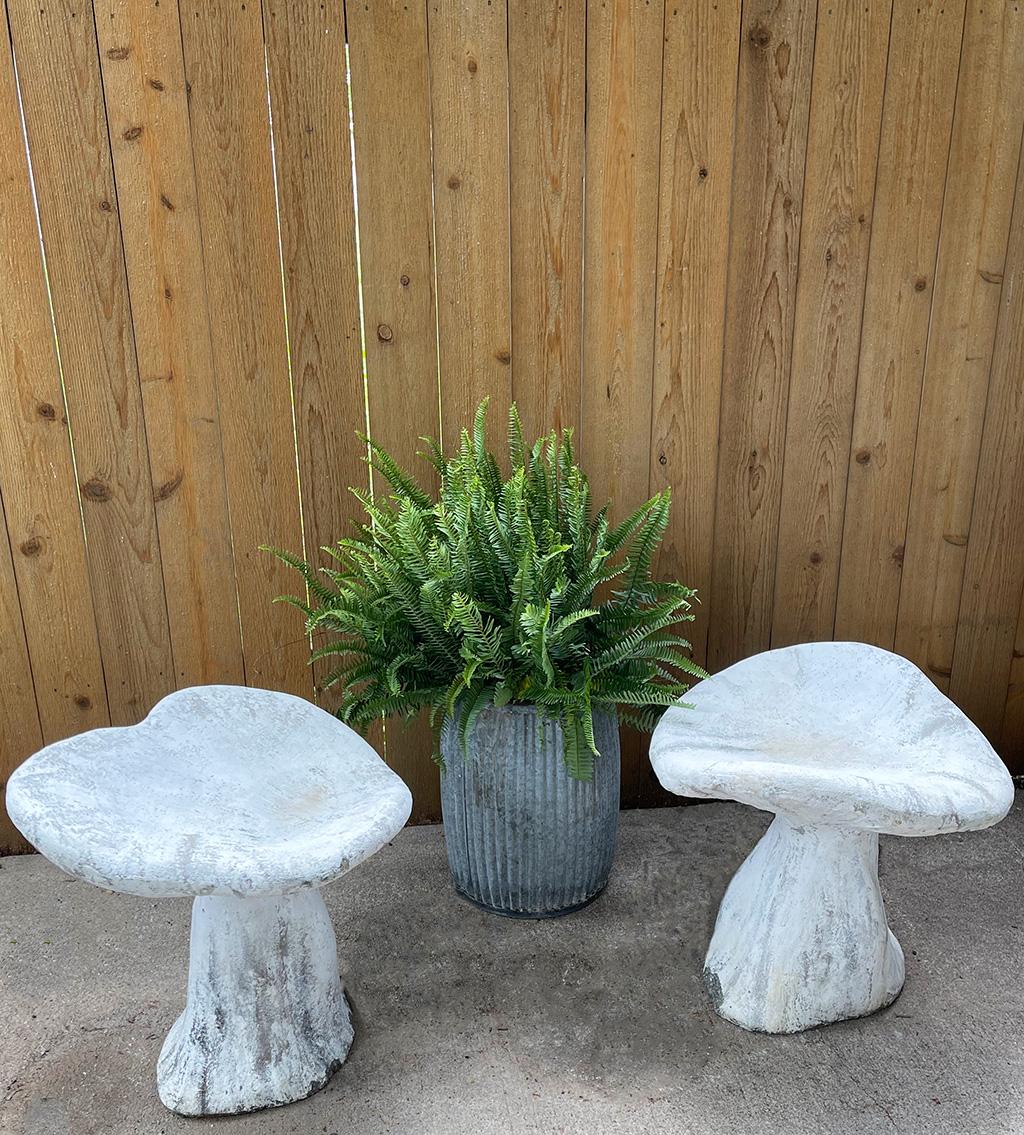 This vintage pair of cement mushroom seats from france are a wonderful addition to any garden setting.