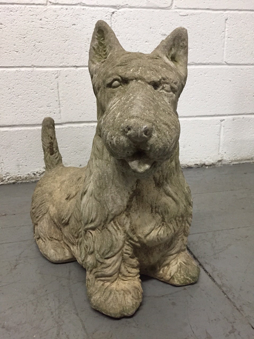 Vintage cement Scottish terrier. Would make a nice addition to an outside garden.