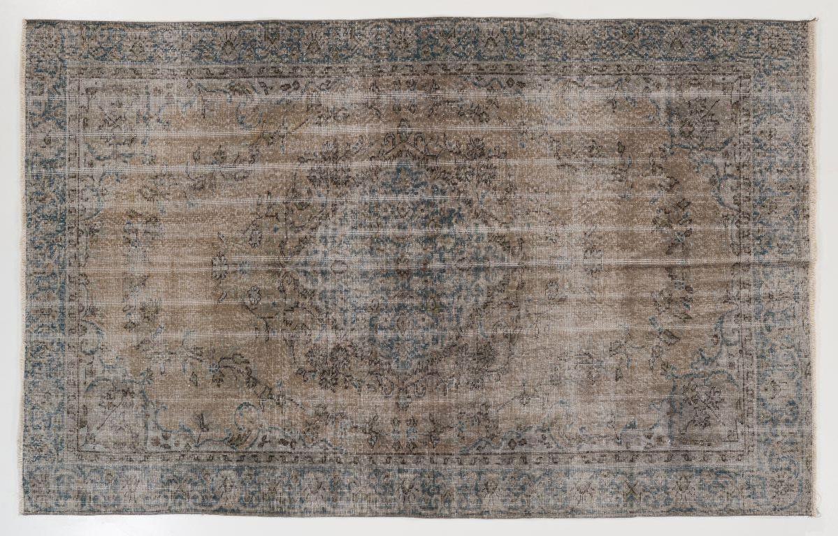 A vintage Turkish rug re-dyed in Gray color.
Finely hand knotted, low wool pile on cotton foundation. Deep washed.
Sturdy and can be used on a high traffic area, suitable for both residential and commercial interiors.

 