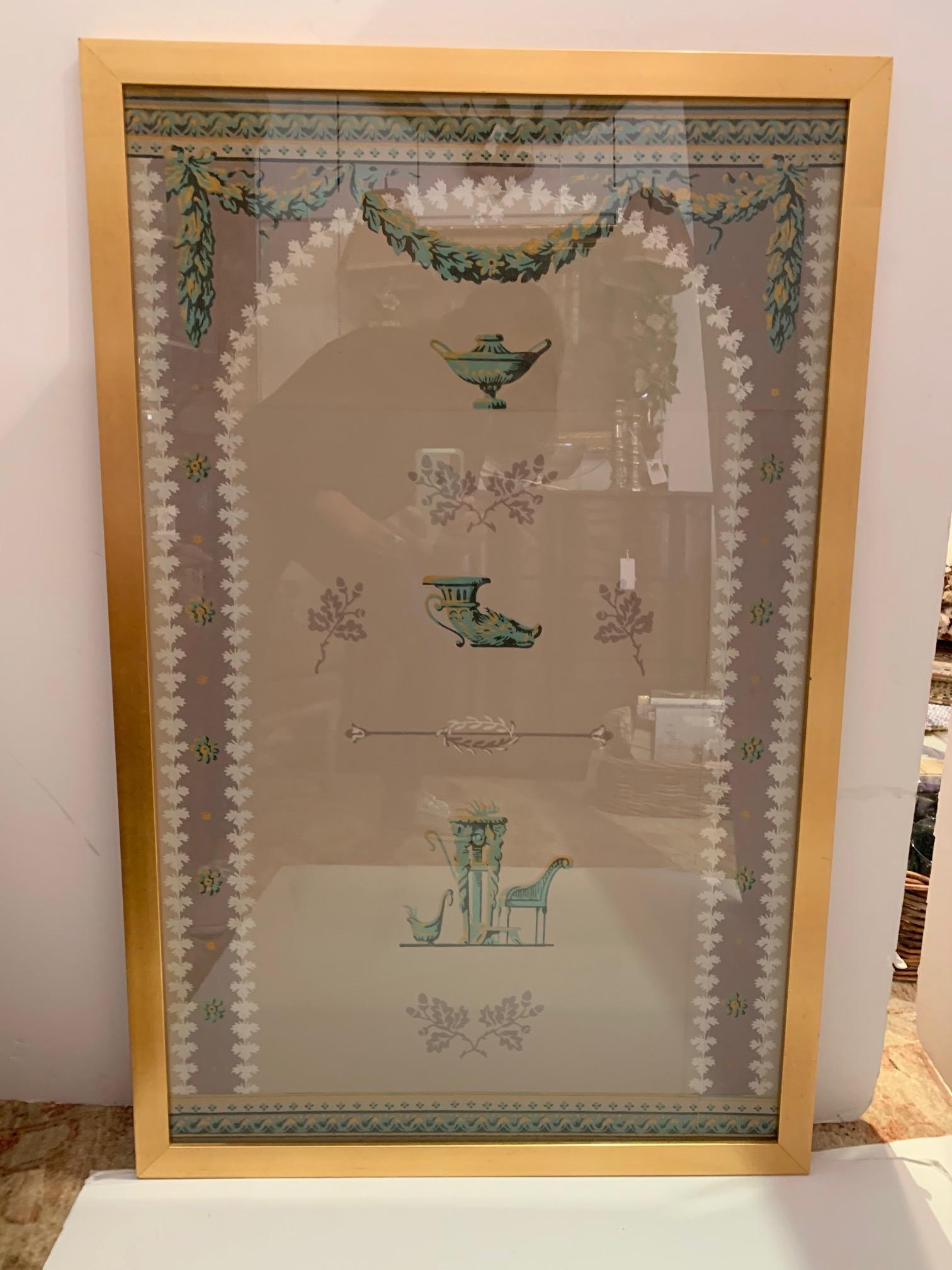 A beautiful framed Empire style wallpaper panel having an urn, rython and brazier supported by catyatids arranged within a garland festooned arcade.
Was salvaged from the 1960 restoration of the Deshon-Allyn House in New London Ct.
Hand printed
