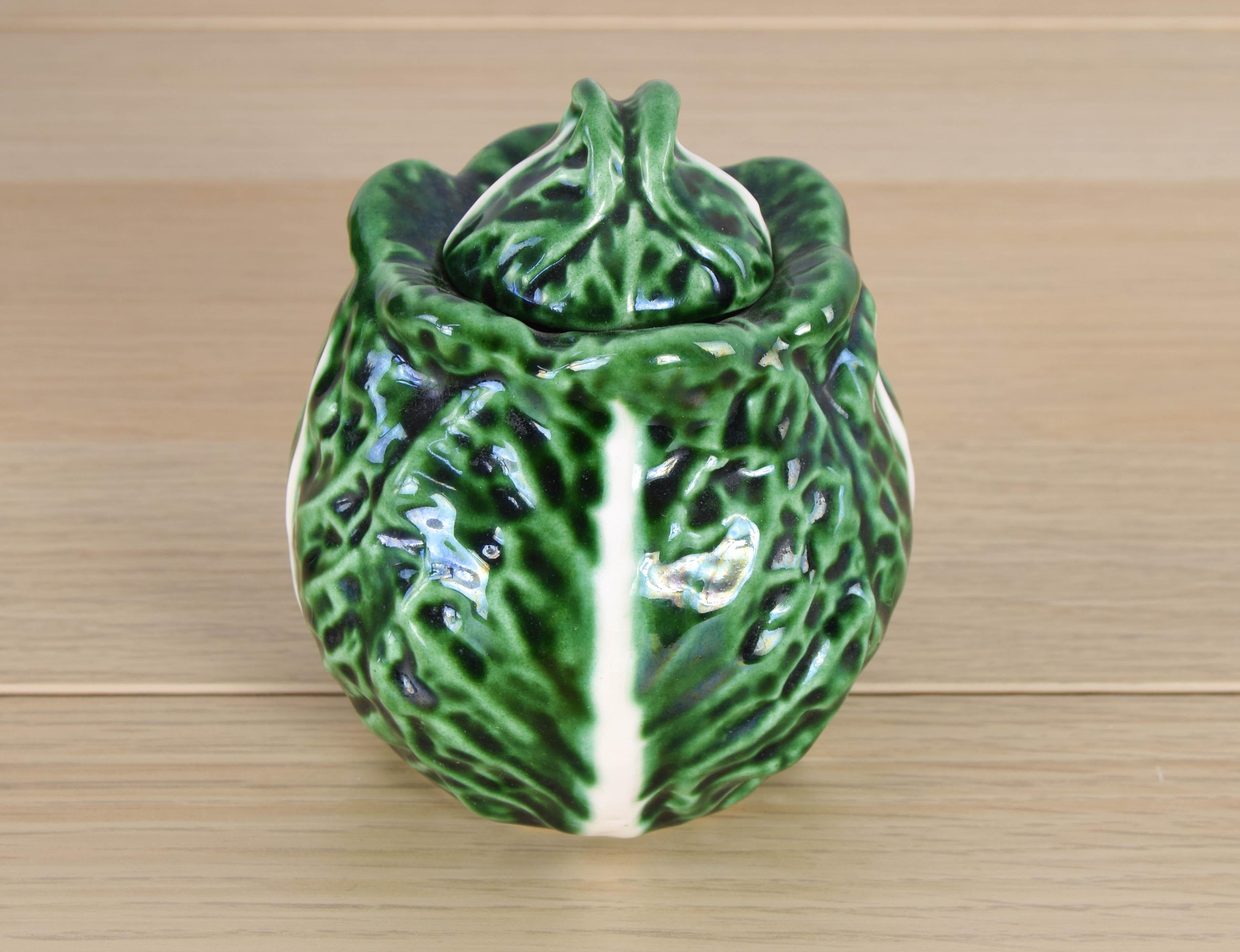 Beautiful and unique enameled ceramic salt shaker handmade in the shape of a cabbage leaf from Bordallo Pinheiro.
The salt shaker is missing enamel on the lid, otherwise it is in excellent condition.
These pieces, famous from the high society of the