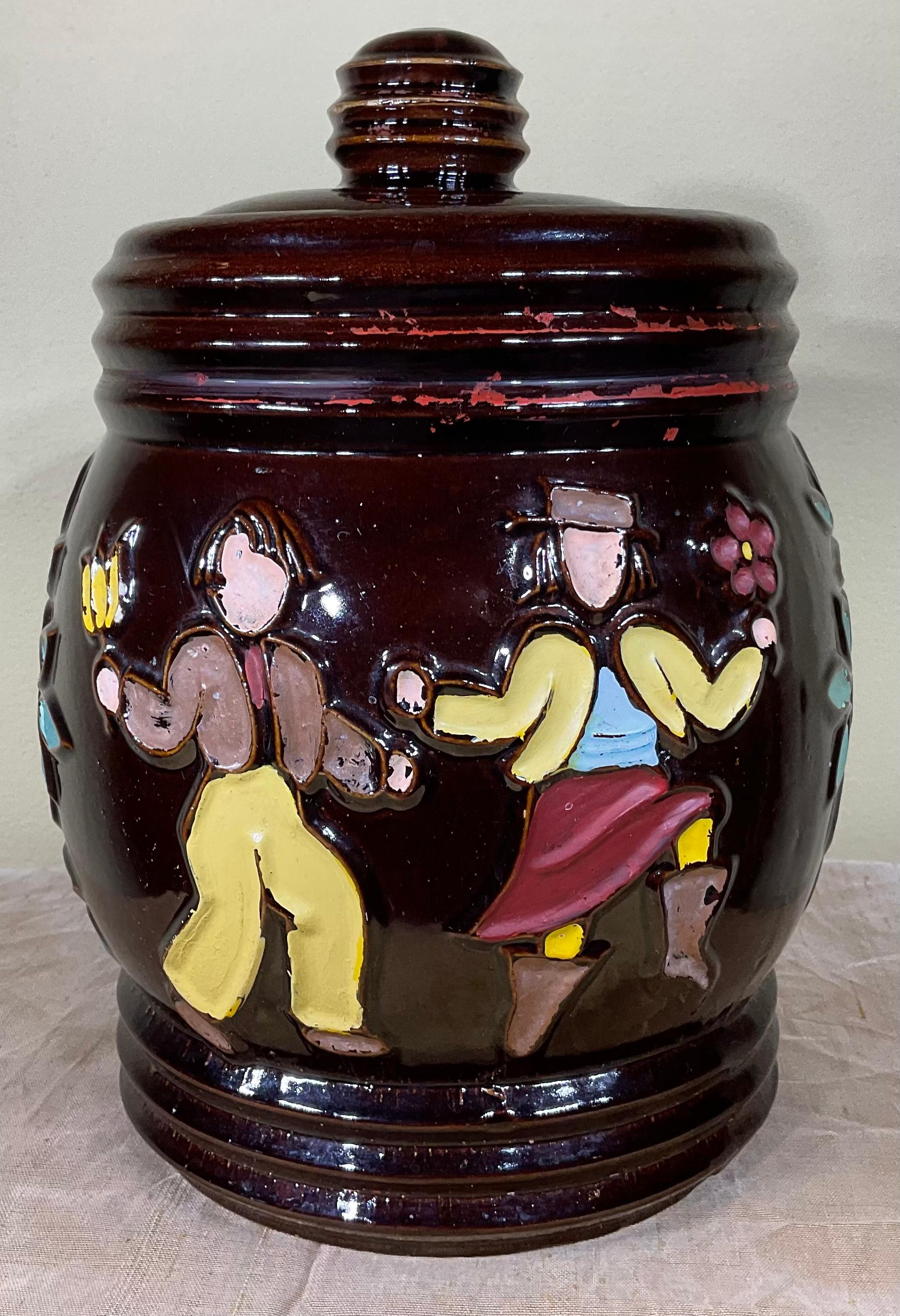 Lovely cookie jar made of ceramic hand-painted, solid ceramic decorative work.