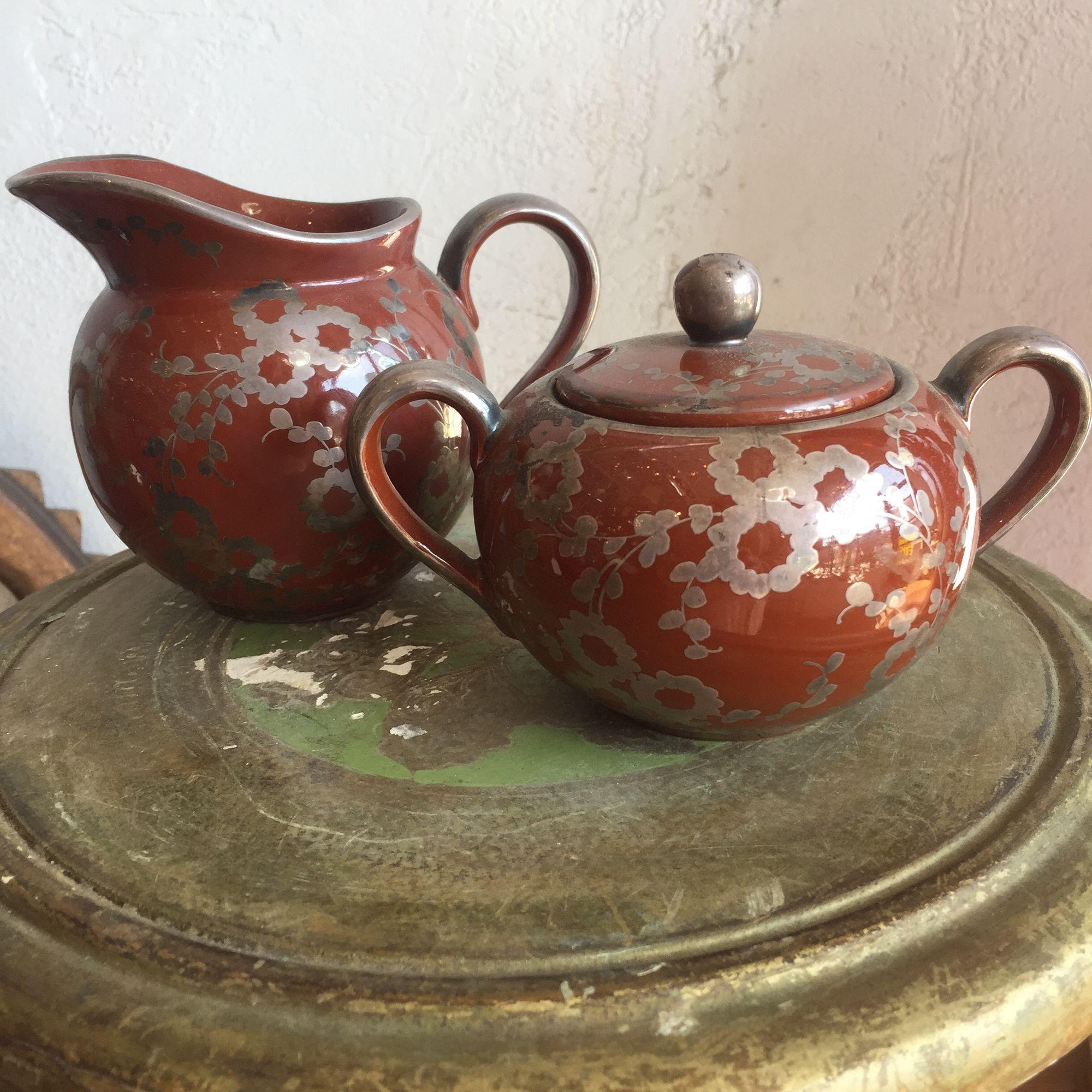 Midcentury japanese creamer and sugar bowl with a lovely detailed flower vine motif in a rake glaze finish.

In excellent mint condition with no chips, no cracks, no scratches.

Creamer 5