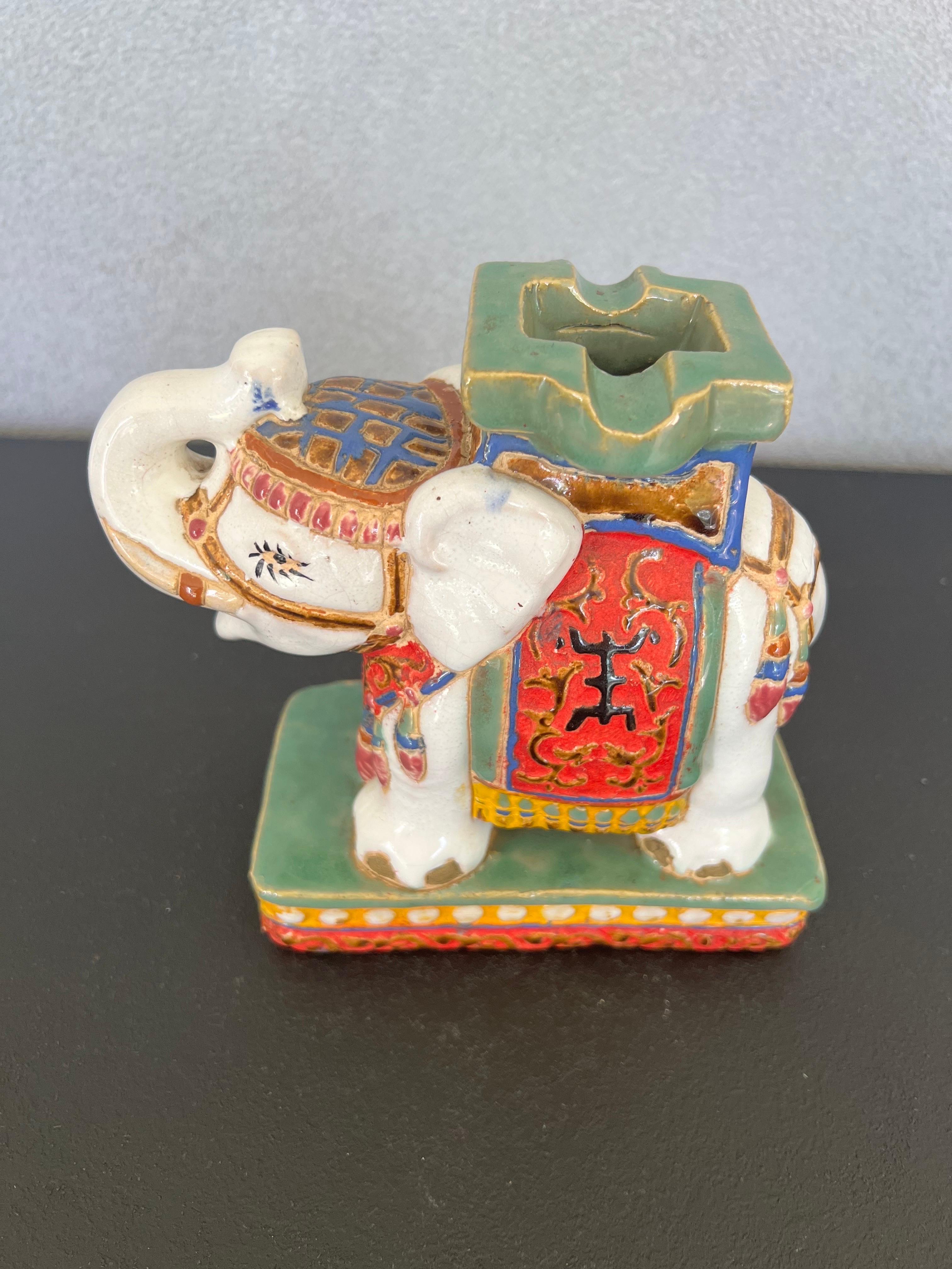 If you love Garden elephant stools this Ashtray is for you!
Beautiful Hand- Painted with the same amount of details you see in garden stools but this is a mini version made as an ashtray 
it could be use as  a small bud vase too,or just as decor on