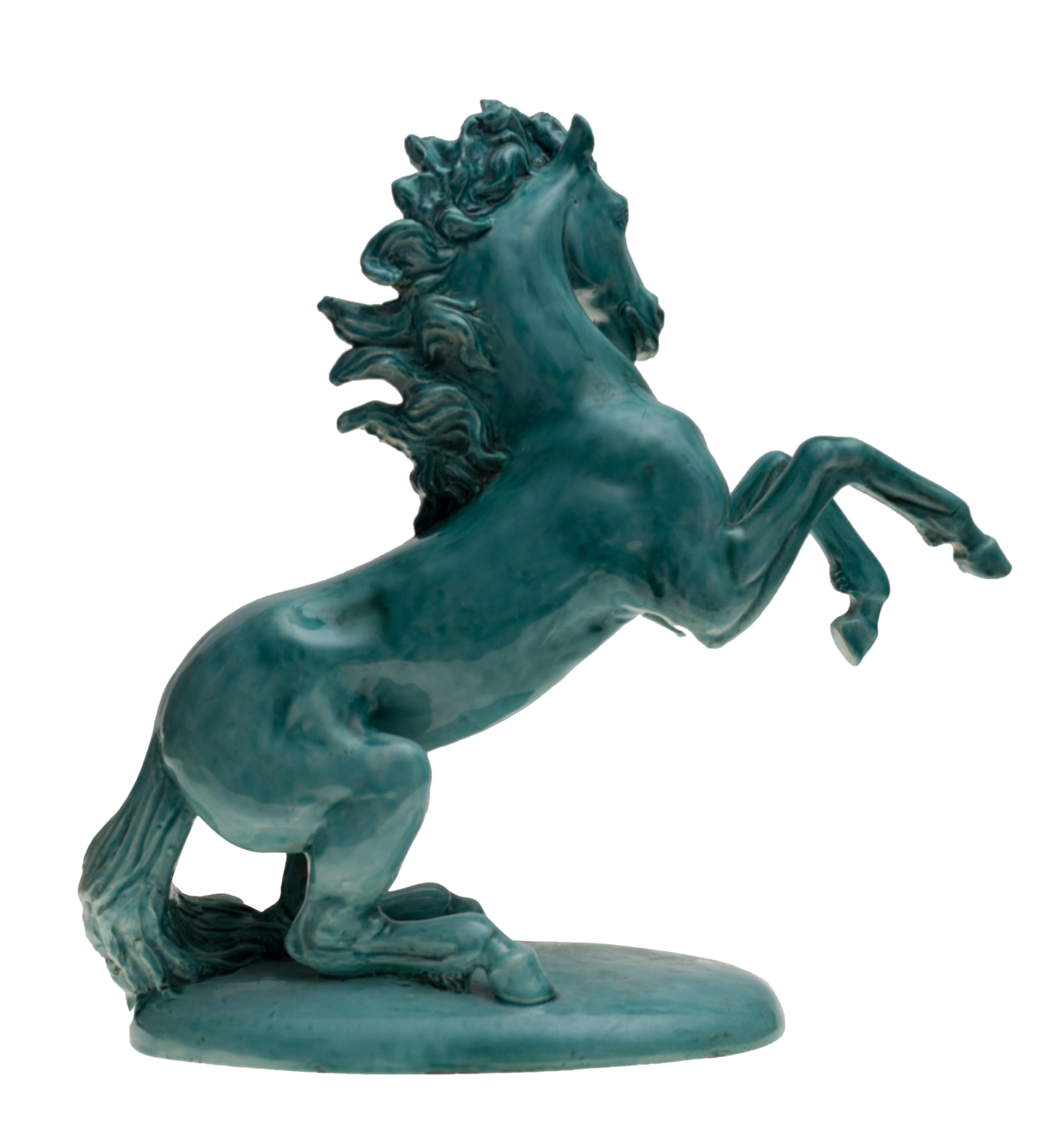 This vintage horse sculpture is an original modern artwork realized in 1927 by an Italian artist. Ceramic sculpture.

Signed “Misa 927” on the base.

The beautiful ceramic sculpture represents a majestic prancing horse.

This artwork is