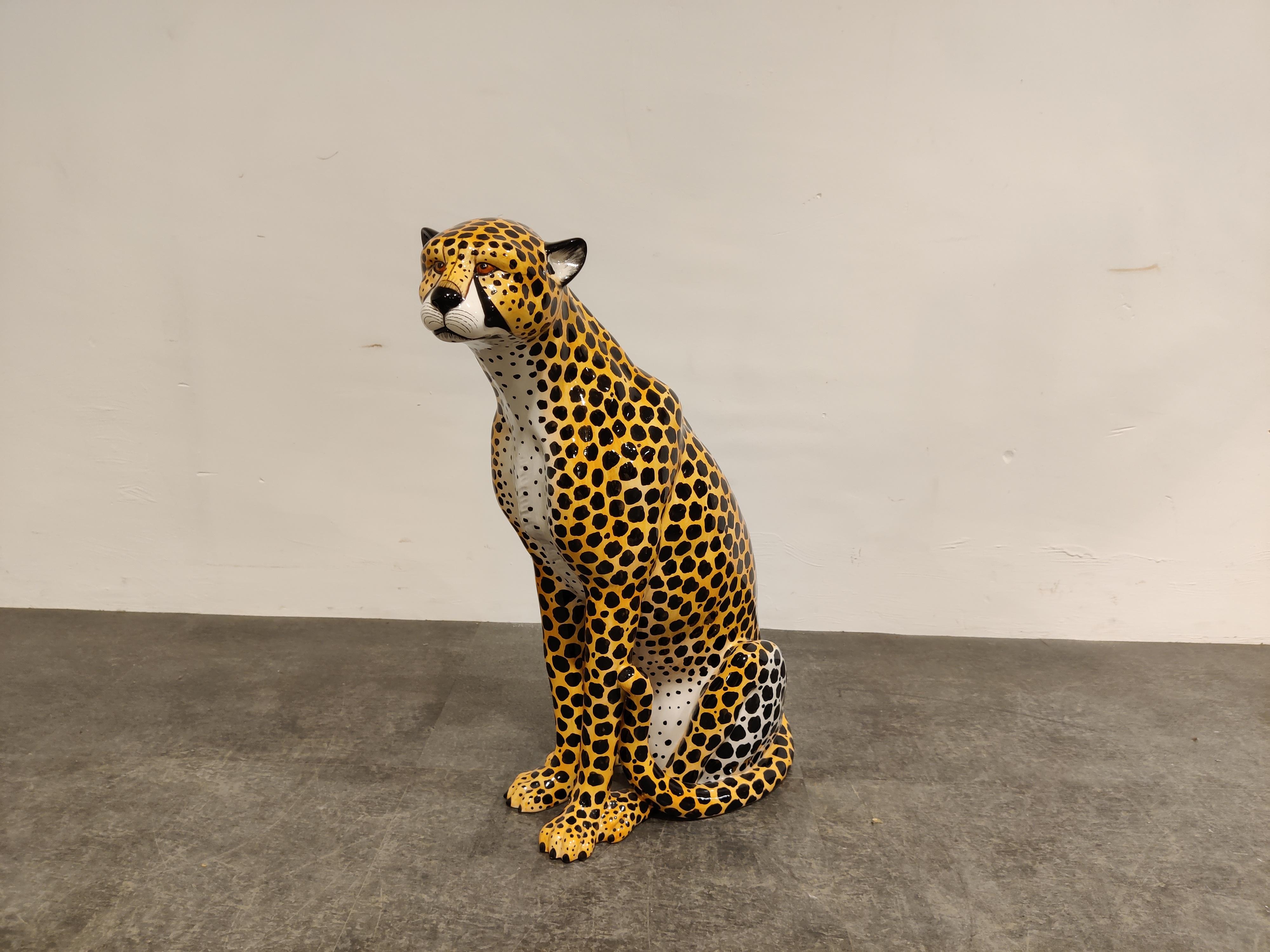 Hand painted ceramic leopard sculpture with open mouth.

Numbered and Stamped 'CSM Italy'

Good condition, no damages

1970's - Italy

Dimensions: 
Height: 66cm/25.98