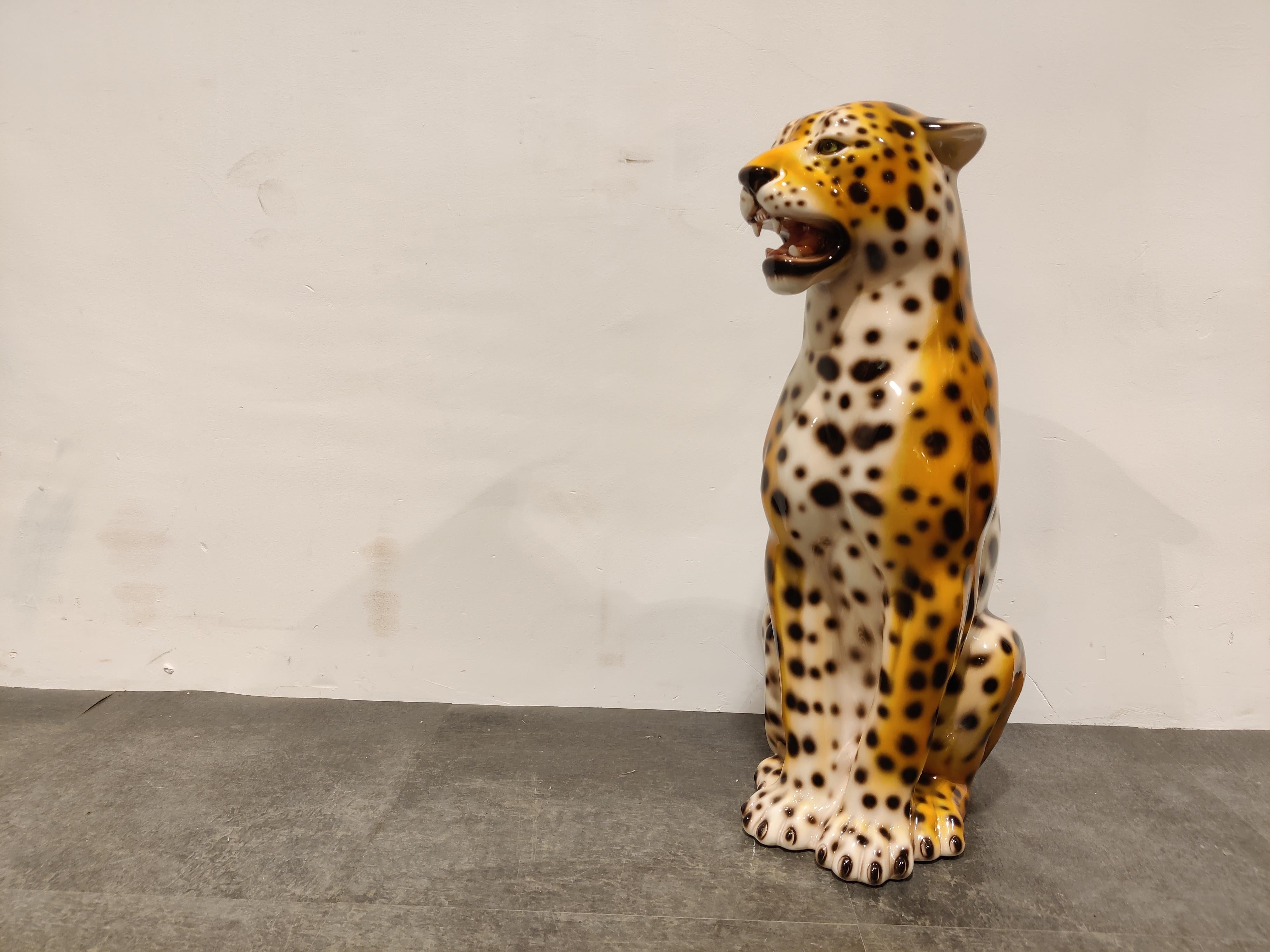 Hand painted ceramic leopard sculpture with open mouth.

Stamped underneath.

Good condition, no damages

1970's - Italy

Dimensions: 
Height: 73cm/228.745.98