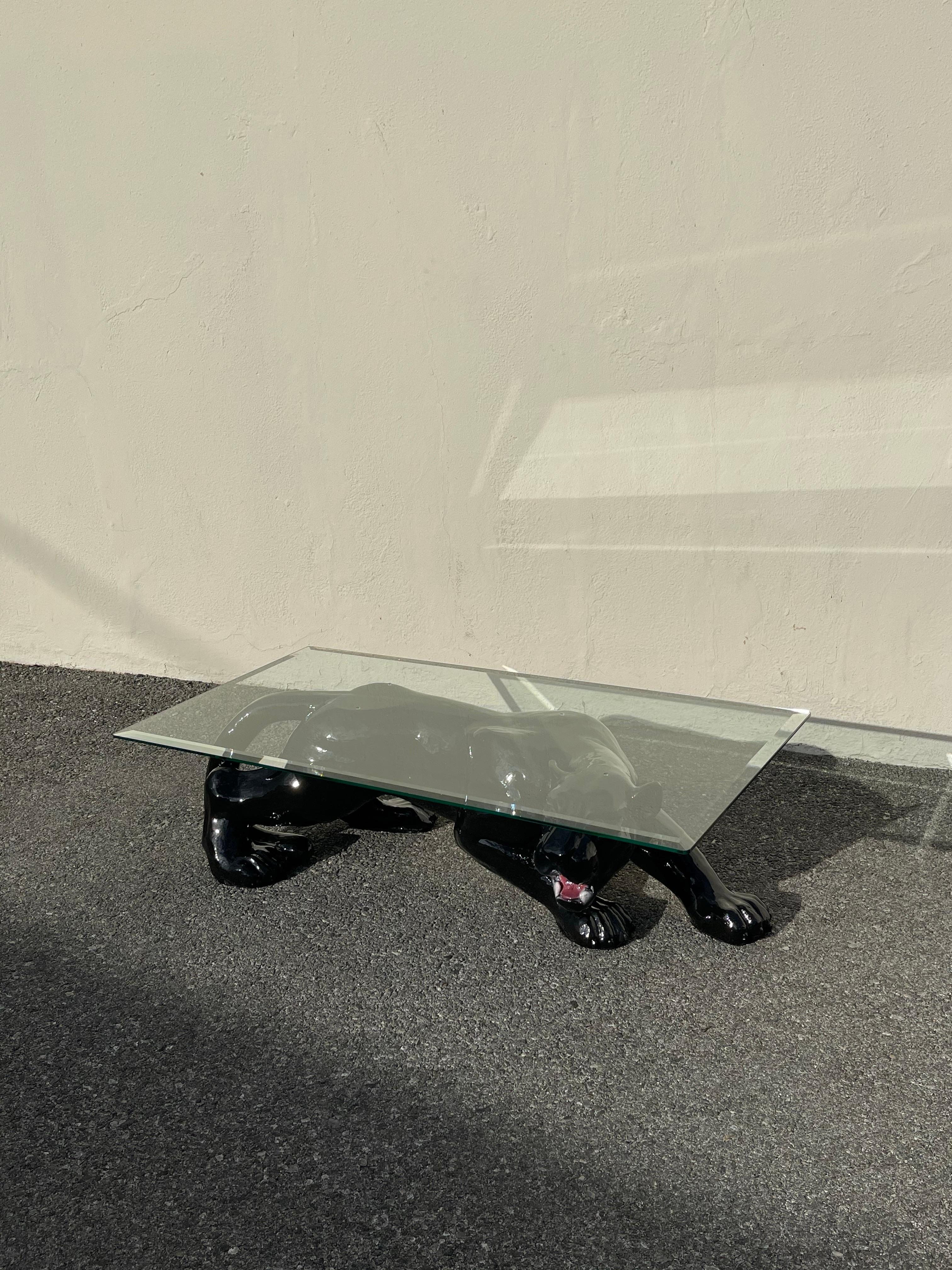 Vintage ceramic and glass panther coffee table. Origin: Circa 1980’s. In excellent condition with some minor scratches to glass, consistent with age.