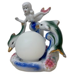 Vintage ceramic table lamp with mermaid and dolphins , 1980s