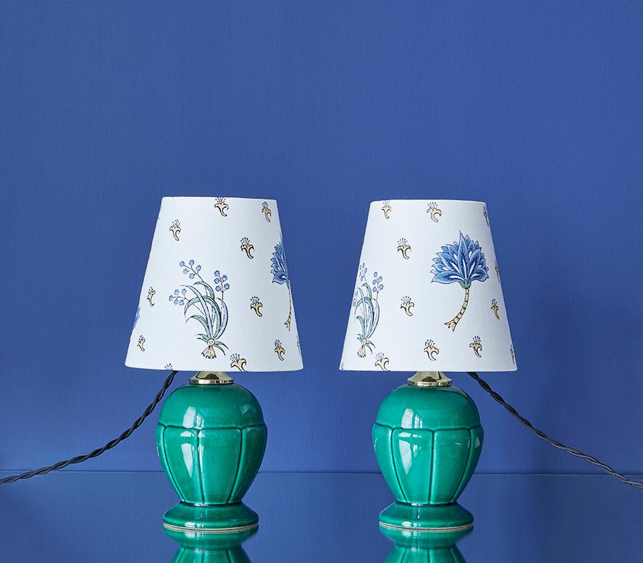 France, 1950's

A pair of ceramic table lamps in green glaze with customized shade

Measures: H 29 x Ø 16 cm.
