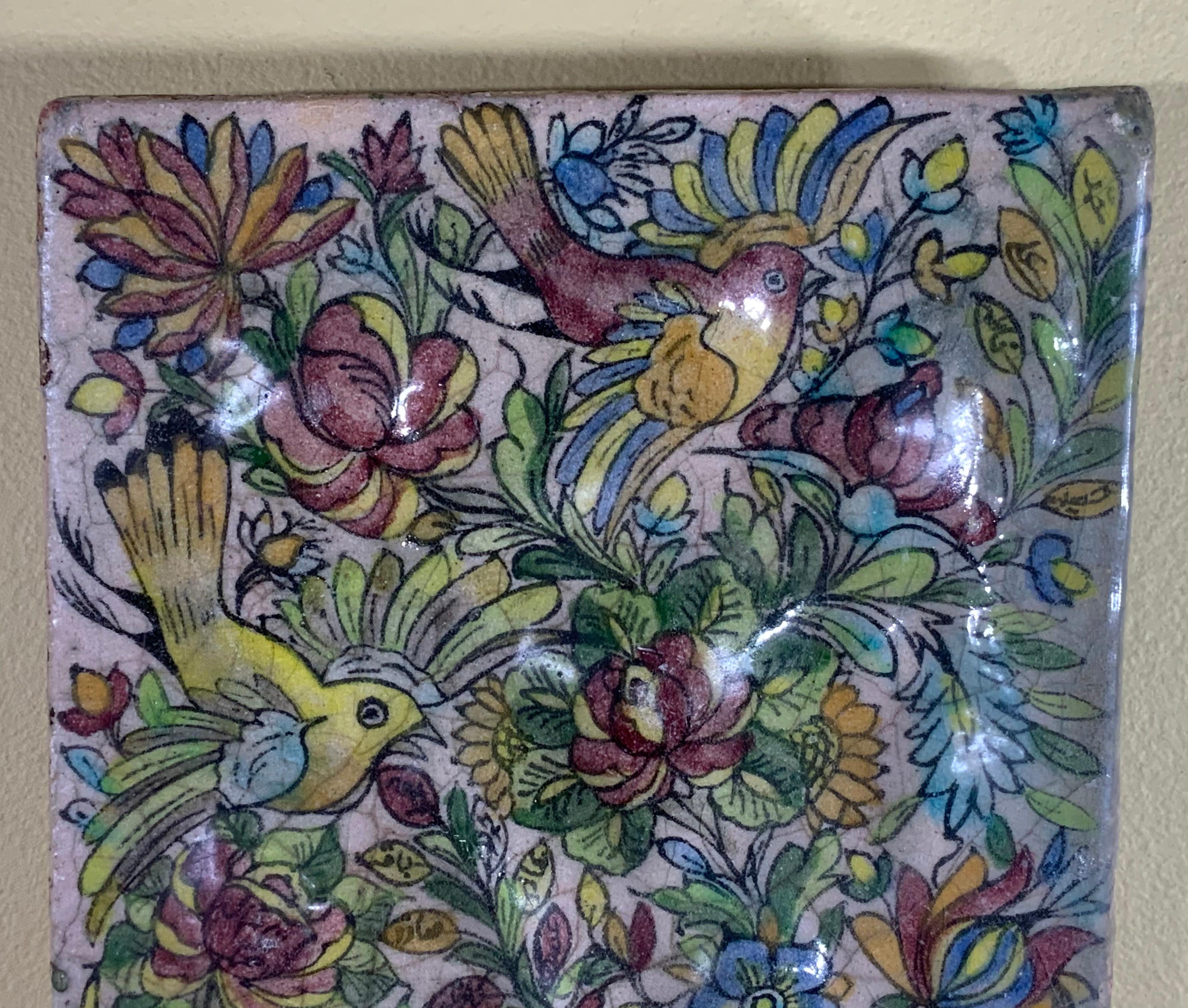 Exceptional tile all hand-painted and glazed with beautiful scenery of birds flying between colorful vines and flowers on a cream color background. Could hang on the wall.
Great object of art for wall display.

 