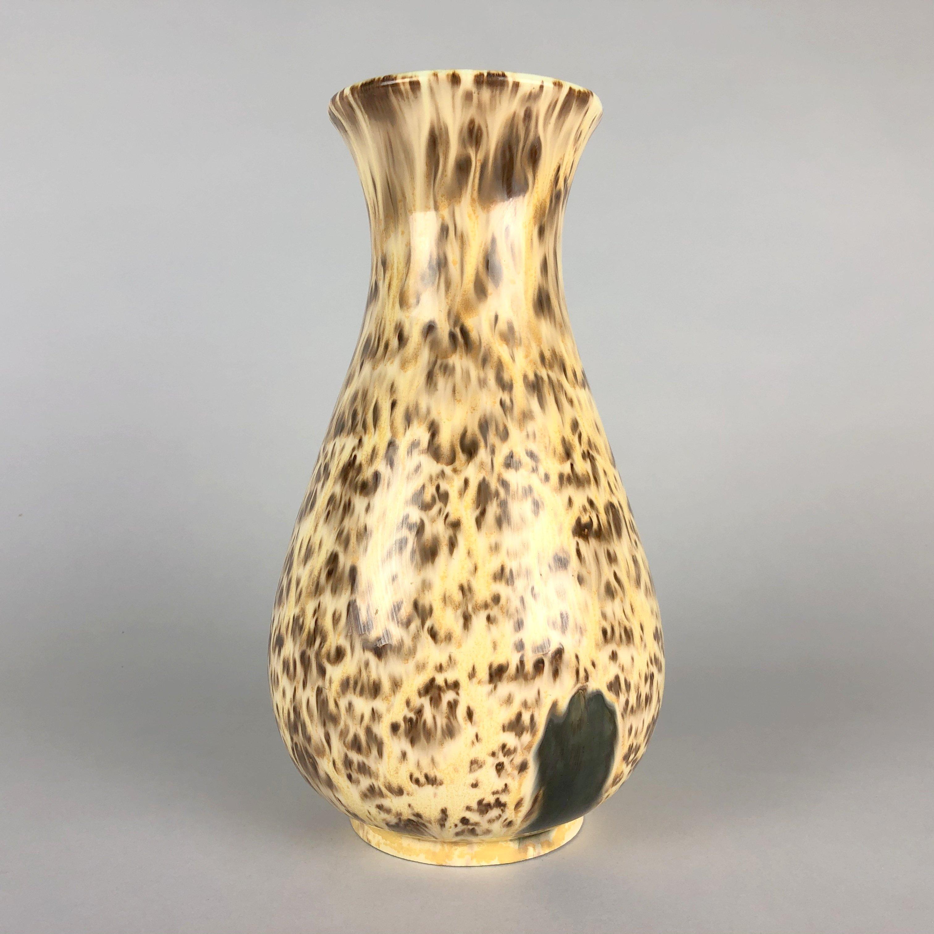 Vintage ceramic vase produced in Czechoslovakia by HOB (Keramika Horní Bríza) in the 1980s. Beige, brown spatter pattern with greenish inside.