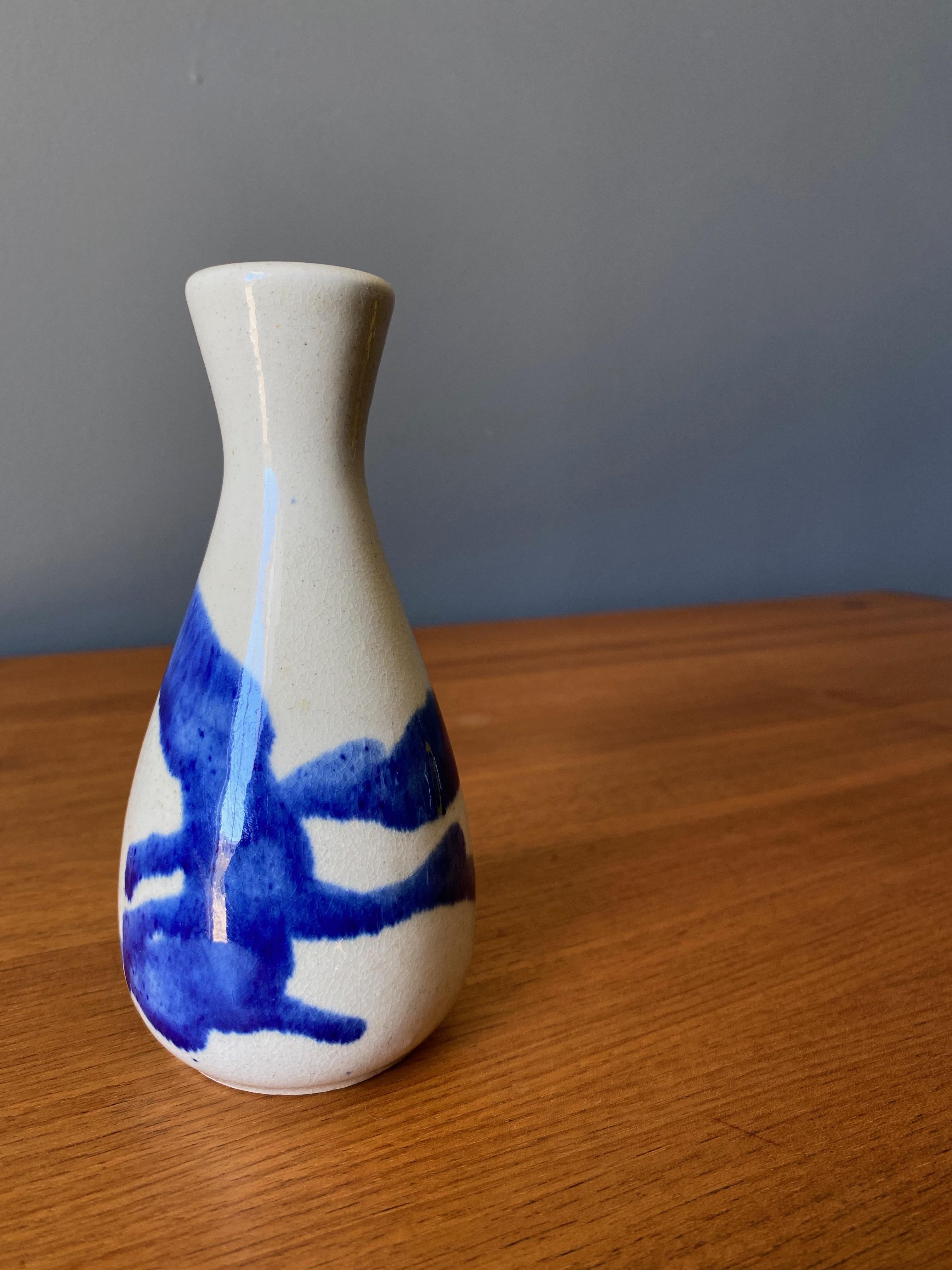 Vintage ceramic vase in blue and cream glaze, Circa 1970s.