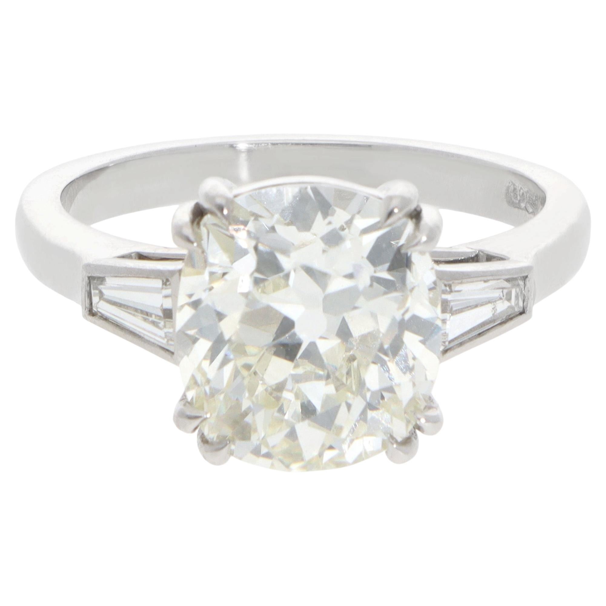 Vintage Certified 4.07ct Old Cushion Cut Diamond Three Stone Ring in Platinum For Sale