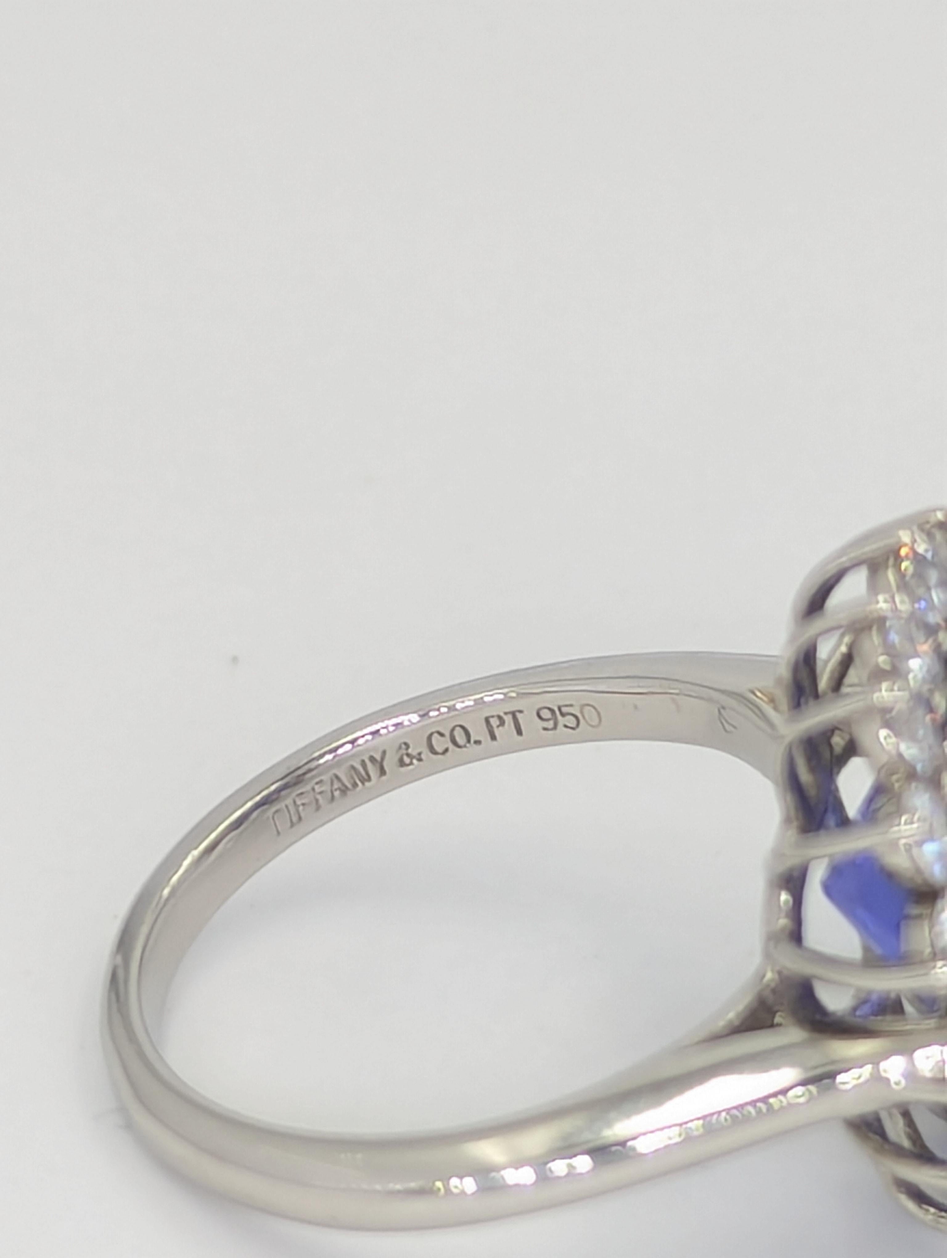 This stunning Tiffany & Co ring is a must-have for any jewelry collection. With a beautiful cushion-shaped tanzanite stone set in a solitaire style with accents, this ring is sure to catch the eye. The platinum metal, with a purity of PT-950, adds