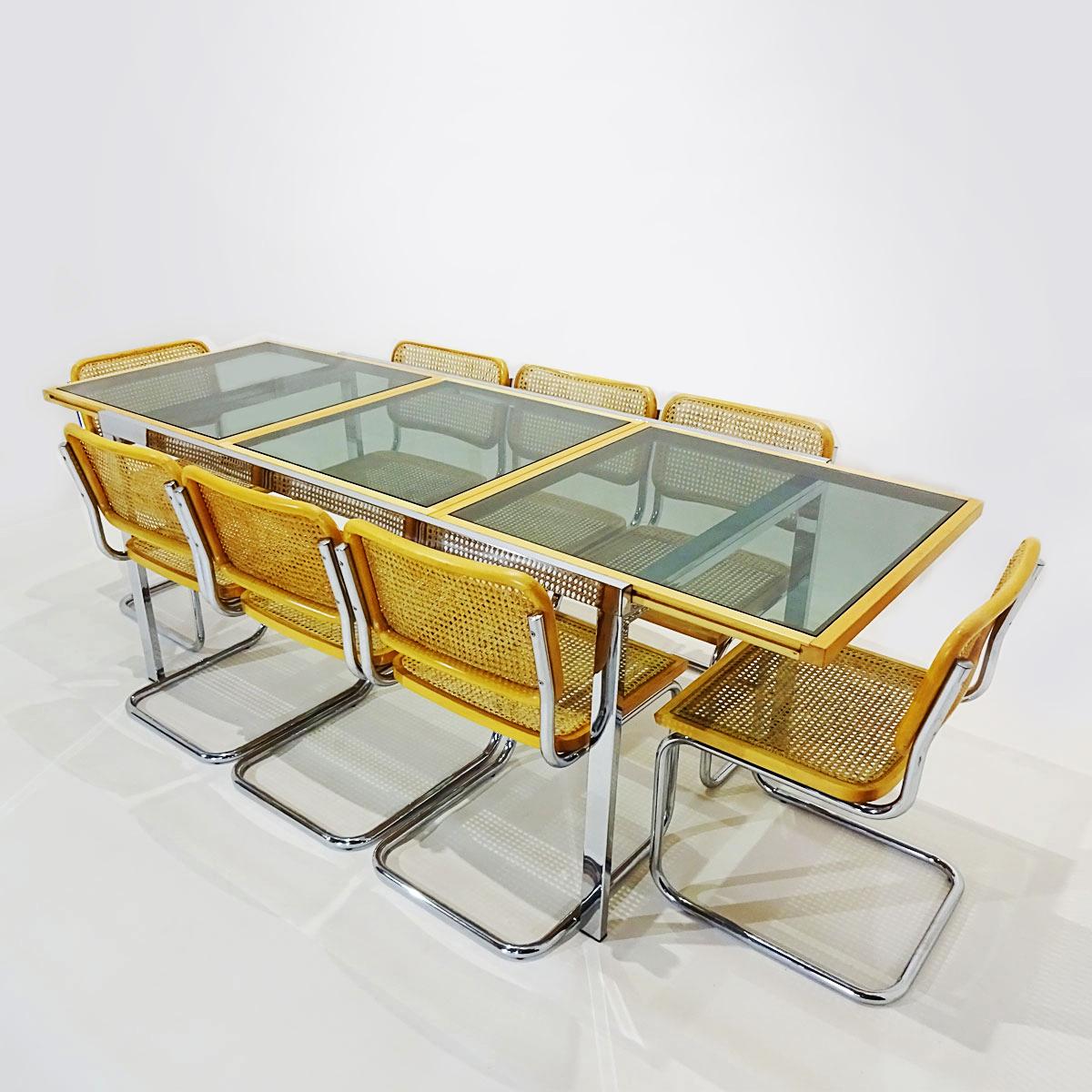 A rare vintage Cesca dining set featuring a beech, glass and chrome dining table matched to 8 beech, cane and chrome vintage Marcel Breuer design B32 Cesca dining chairs dating from 1975.

Originally designed in 1928 Marcel Breuer’s model B32,