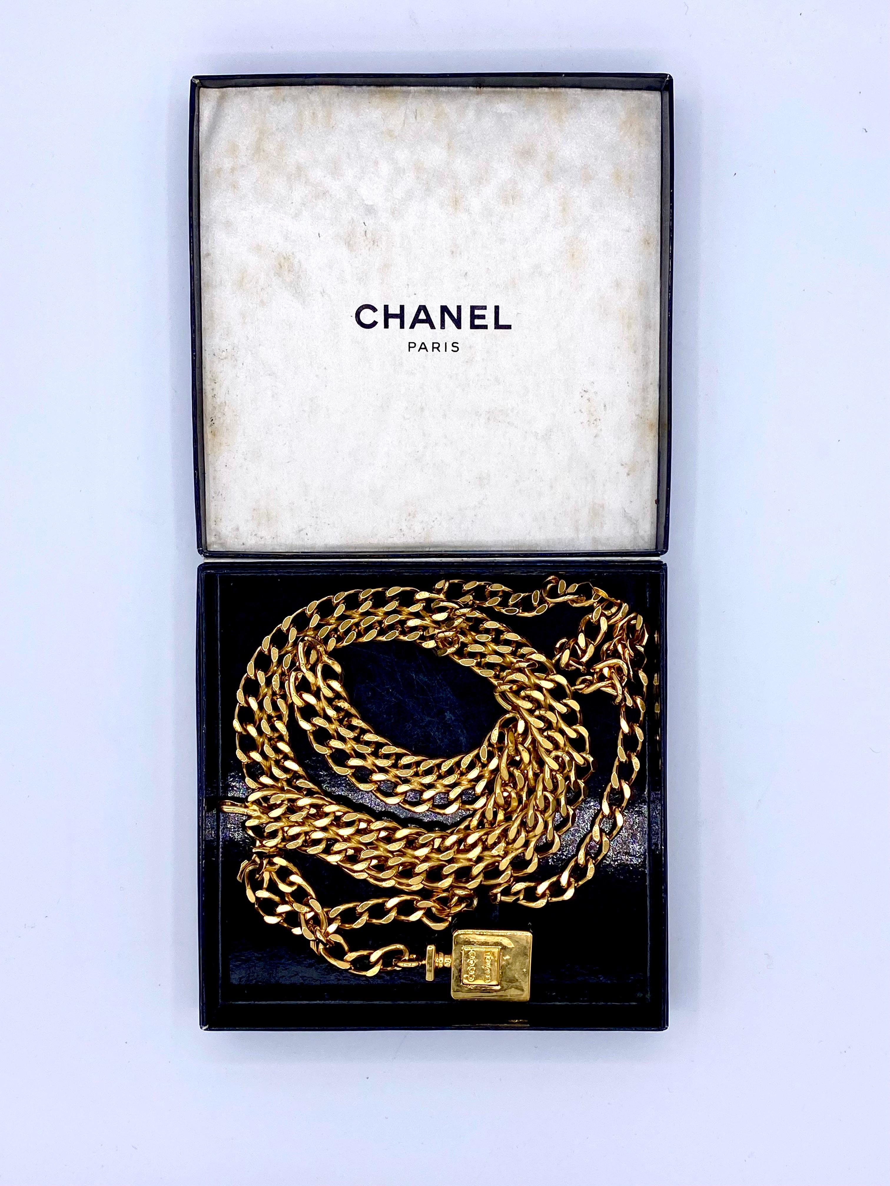 Vintage chain belt, draped with Chanel perfume bottle For Sale 1