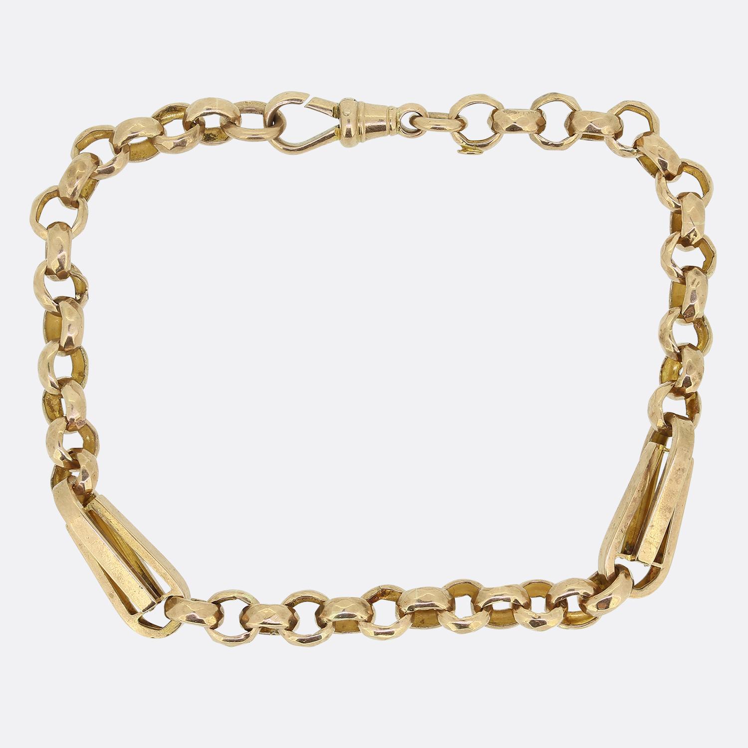 Here we have a lovely vintage chain bracelet. This piece has been crafted from 9ct yellow gold with a slight rose tint and is comprised of faceted belcher links which is securely fastened around the wrist via a dog clip clasp. 

A wonderfully