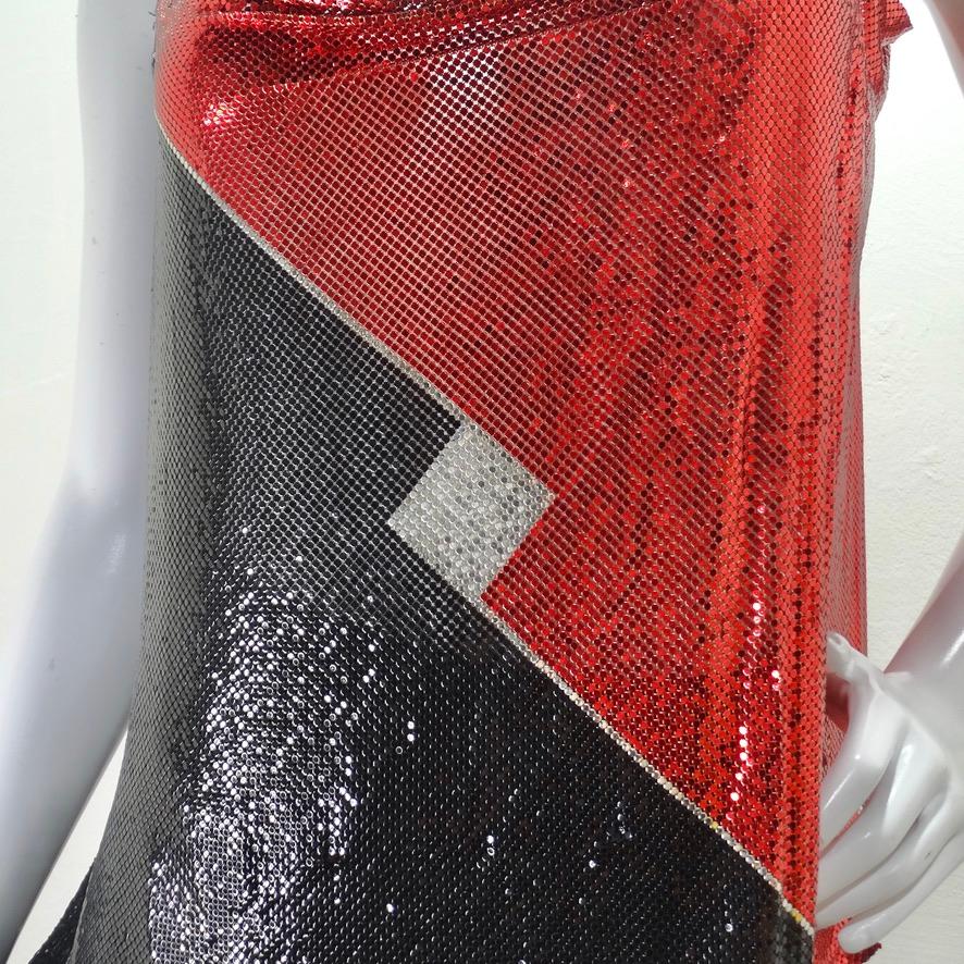 Flirty and festive vintage chainmail tank top in the most eye catching red, black and silver print. Featuring leather chord straps that tie which allow for versatility as you can adjust them to your desired fit. The center has a silver diamond shape