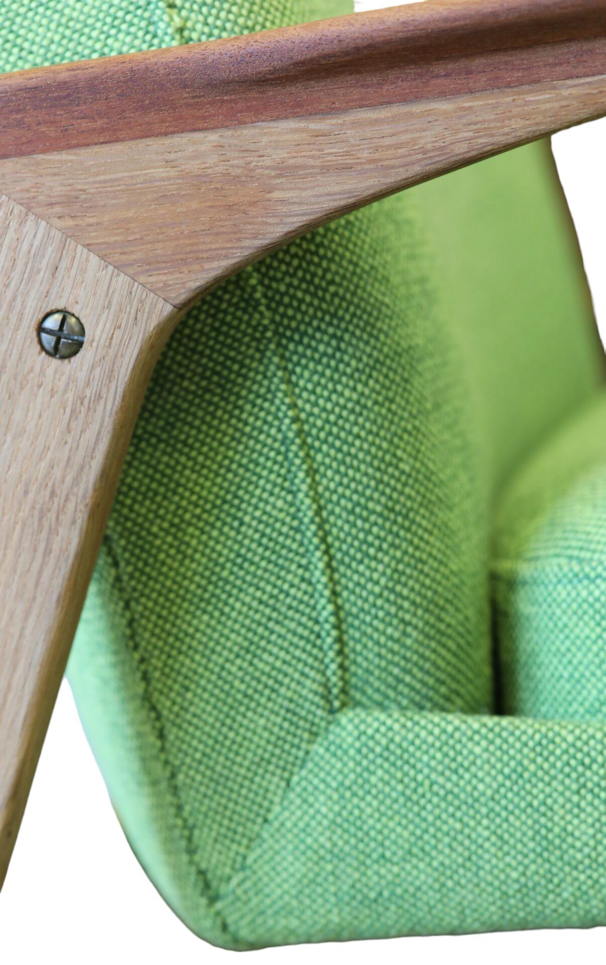 Armchair in a wonderful model and in a color that energizes the home! The model is from the 1960s and was designed by Ib Kofoed Larsen!

The armchair has a loose cushion that lies in the frame of the seat, see pictures, which gives the chair both
