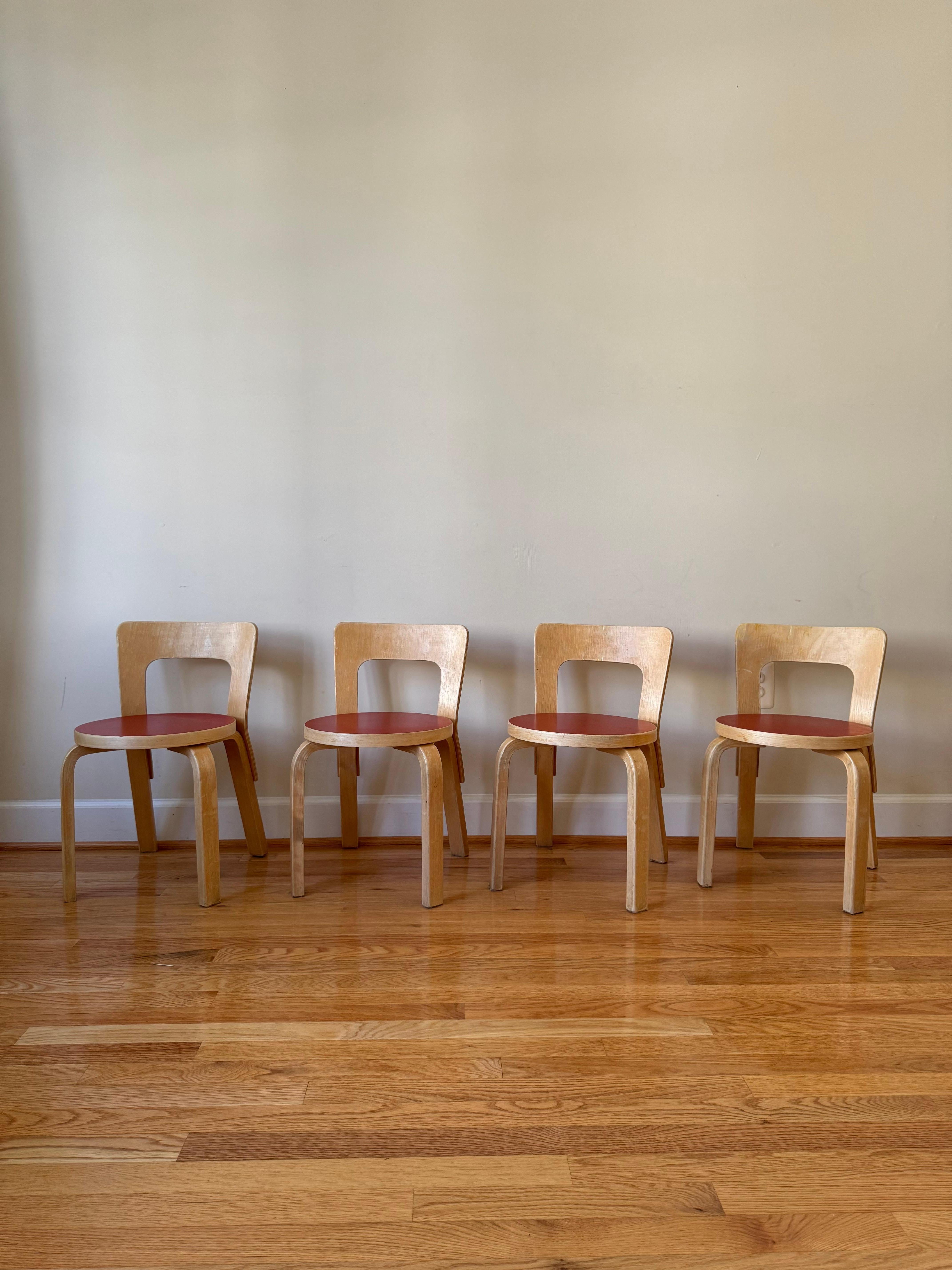 Children’s Chair N65 boasts clean lines and a simple, elemental structure. 
The chair models a low rectangular backrest formed from a single piece of birch plywood. Since the backrest follows a slight curve, it forms naturally to the back, offering