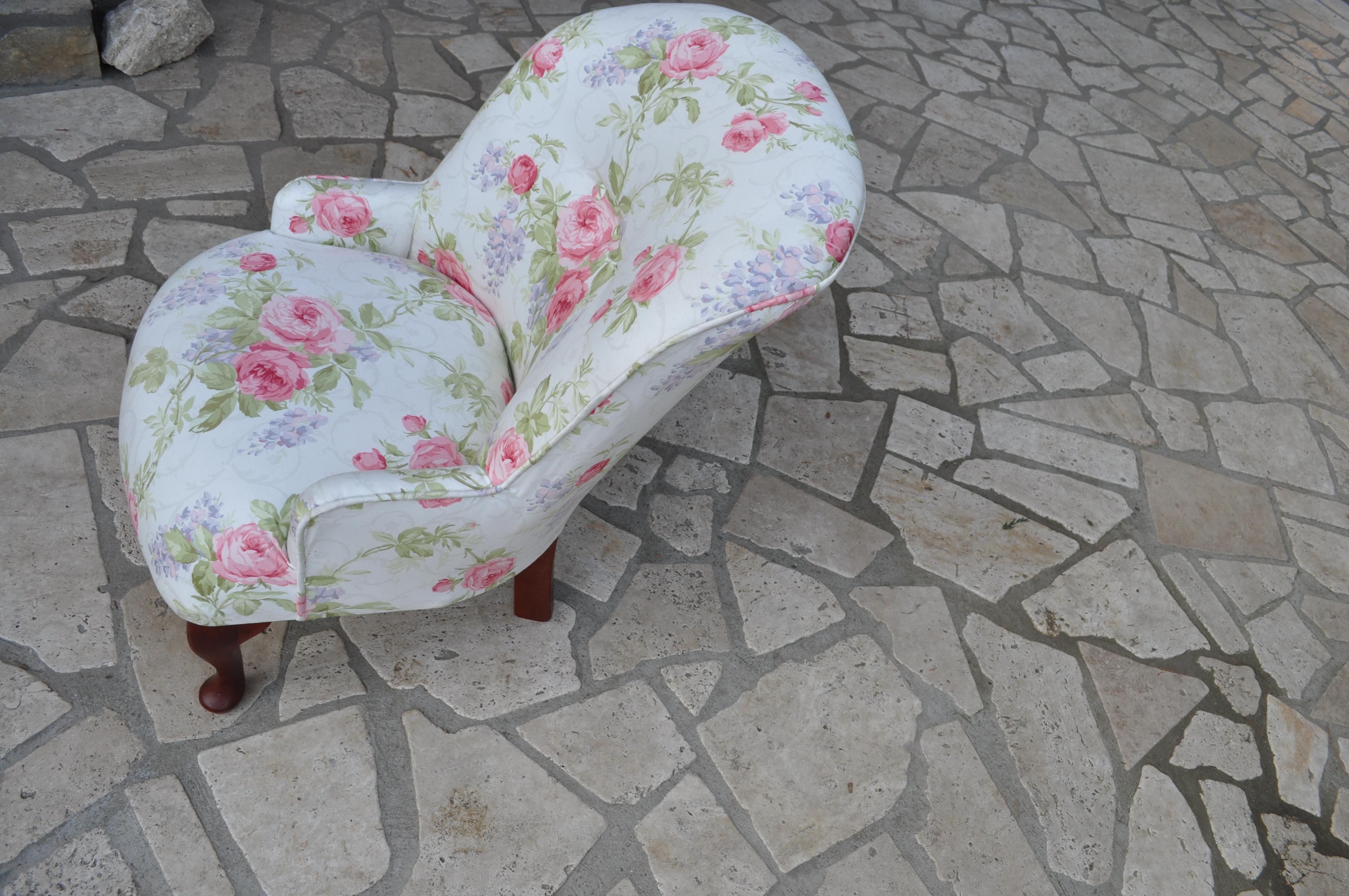 Vintage chair with floral upholstery. Original condition.

 Mahogany legs.