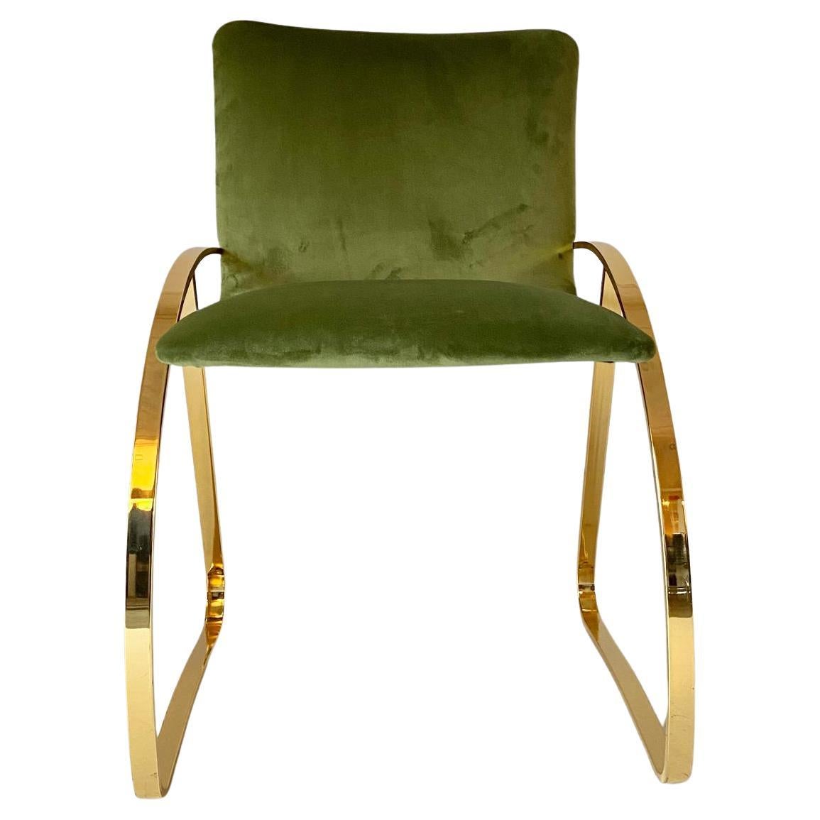 A vintage velvet desk chair, manufactured in Italy in the 1970s. Steel golden chromed structure and beautiful green velvet cover. Chromed has been polished and the water proof green velvet added brand new. The item has a very confortable a slightly