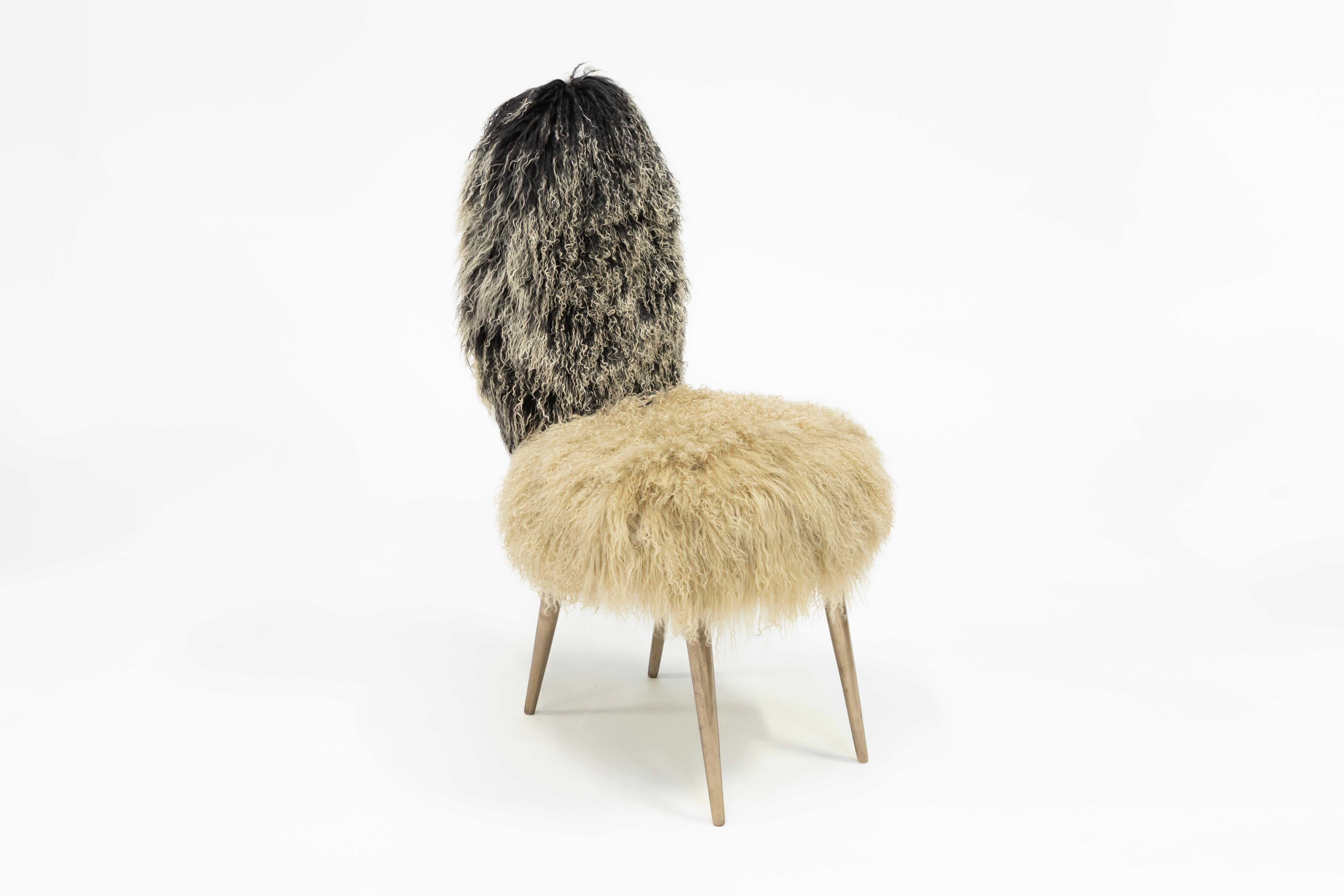 Dialoghi Mimetici collection by Draga&Aurel:

Original Italian 1950 chair designed by Umberto Manscagni. Structure in wood. Upholstery in second-hand Mongolia furs. Legs in cast bronze.


Color white/camel. Size cm L 45,W 51,H 99
Please note that