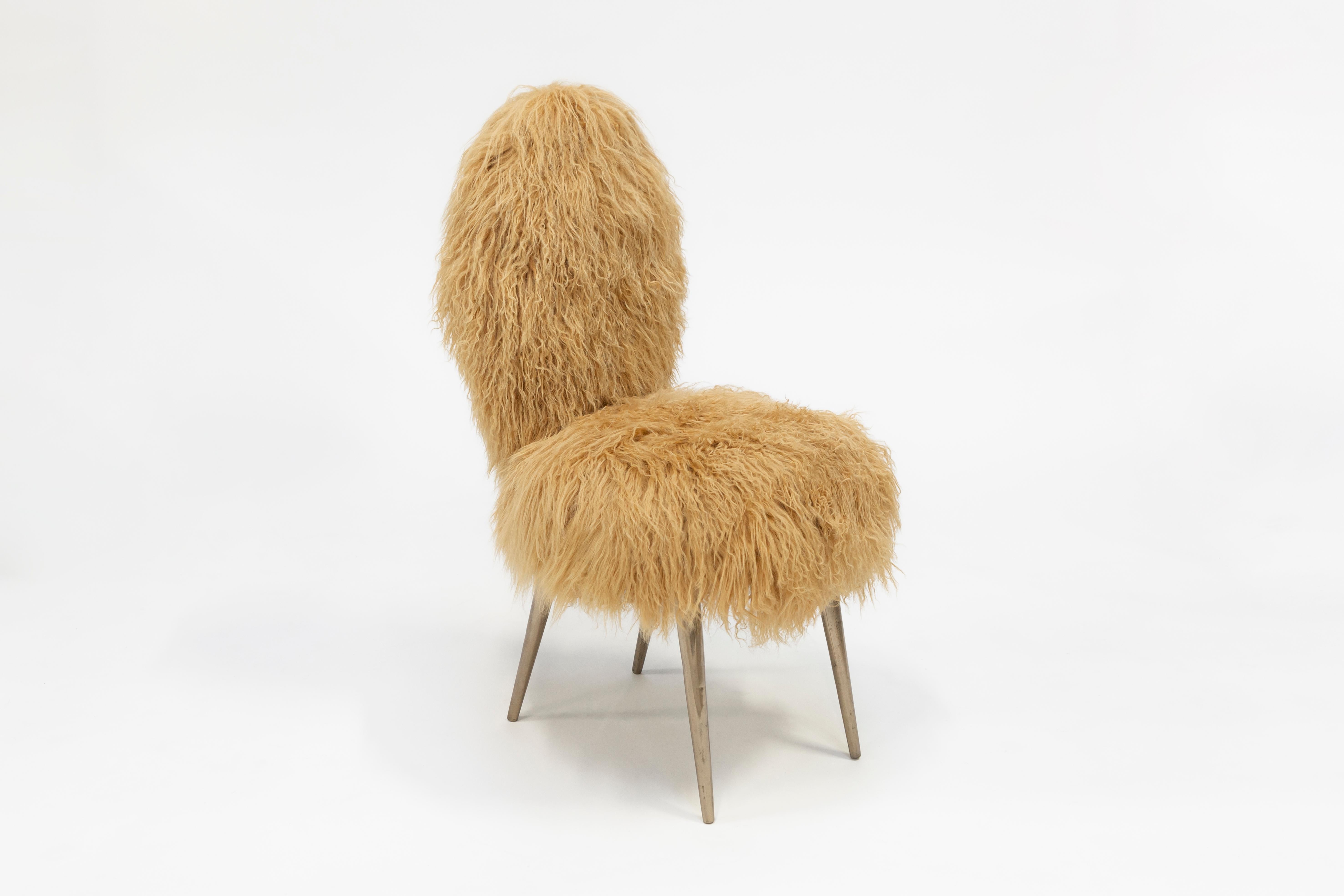 Dialoghi Mimetici collection by Draga&Aurel:

Original Italian 1950 chair designed by Umberto Manscagni. Structure in wood. Upholstery in second-hand Mongolia furs. Legs in cast bronze.


Color black/white size cm: L 45, W 51, H 99
Please note that