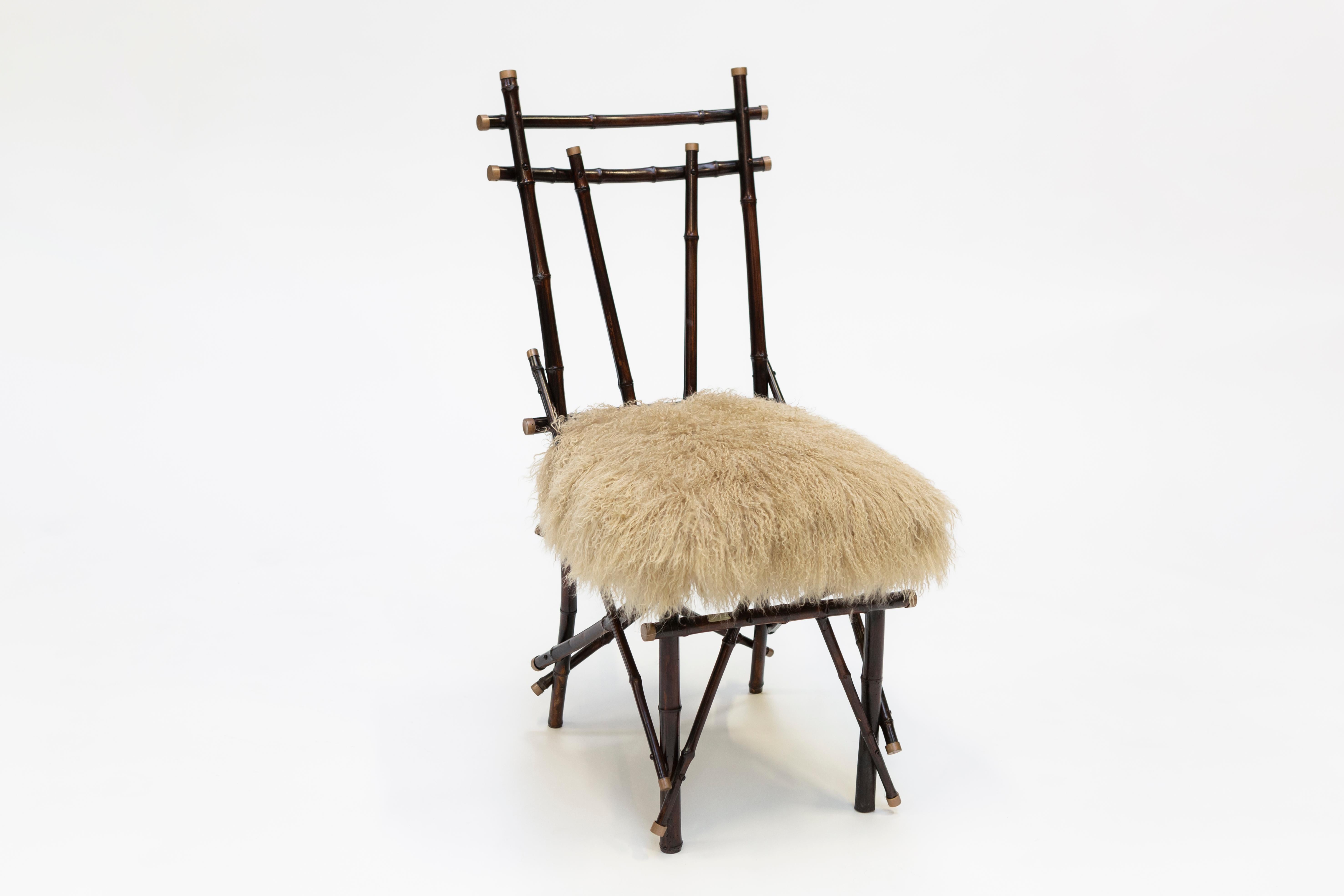 Dialoghi Mimetici collection by Draga&Aurel:

Original Italian 1960 chair.
Structure in bamboo. Upholstery in second-hand Mongolia furs. Brass details.


Color brown-white. Size cm L 60, W 63, H 114
Please note that our prices exclude VAT. VAT may