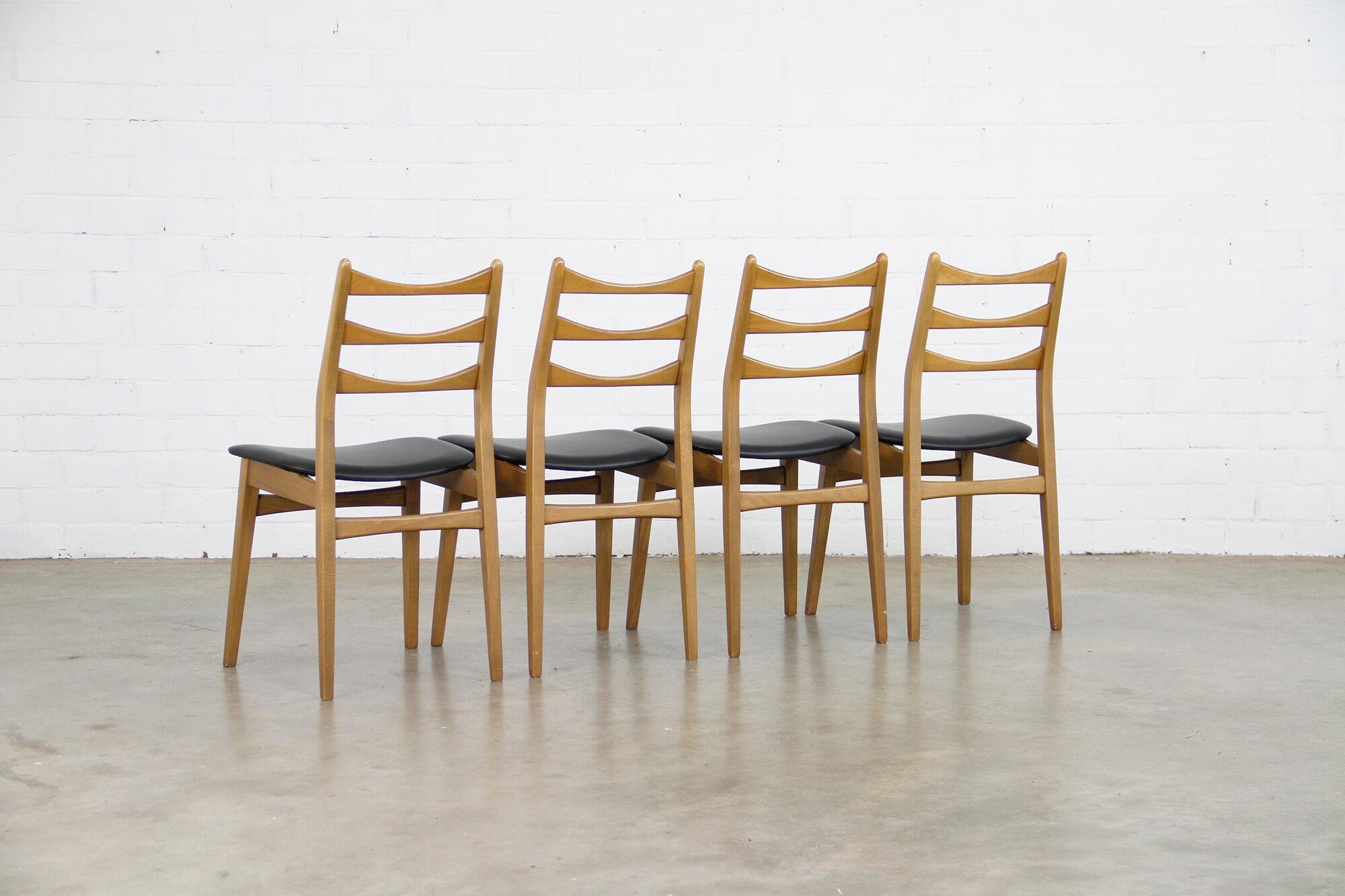 Vintage chairs in black skai by Mignon Möbel, set of 4. Reupholstered.