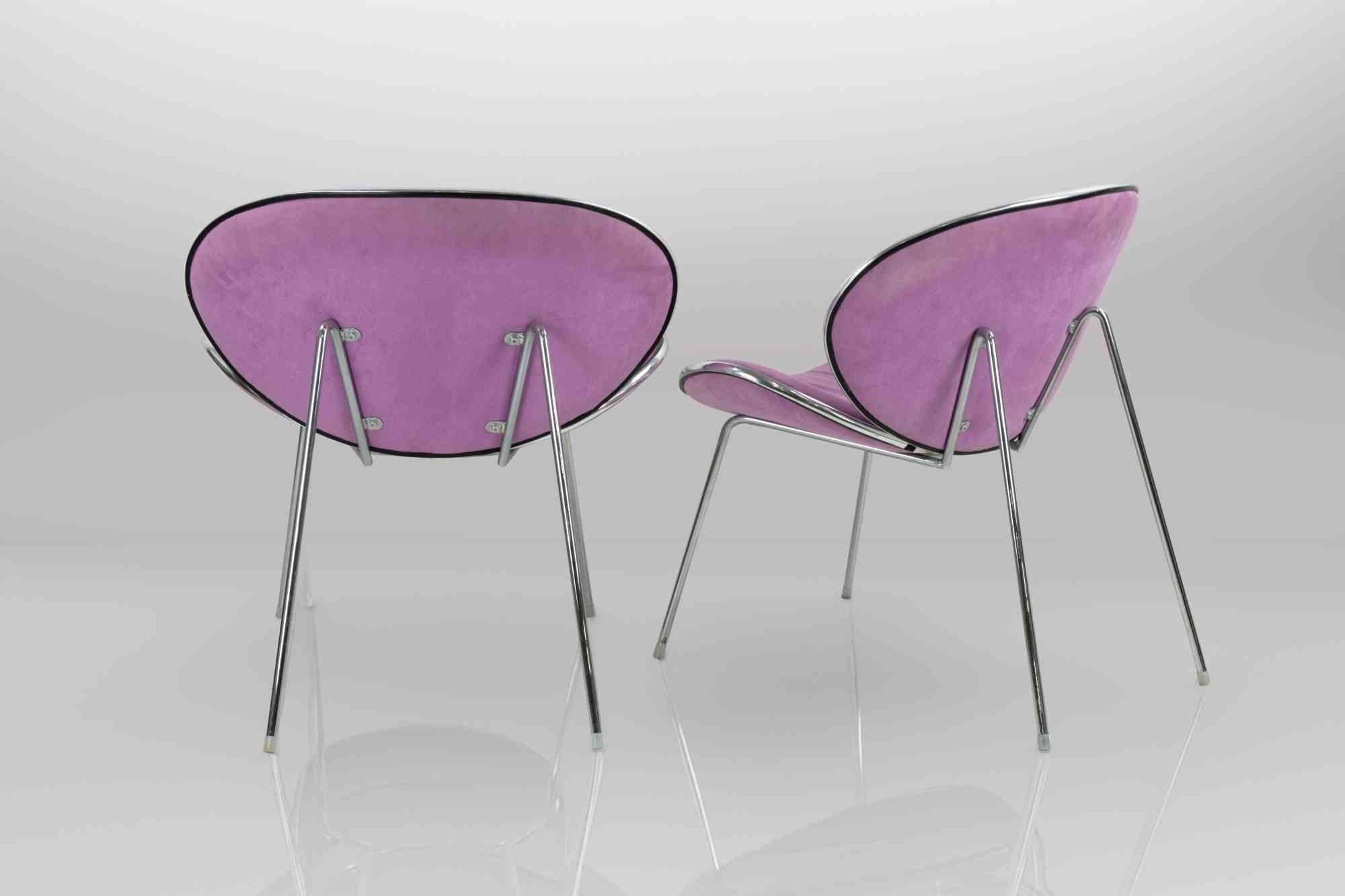 Vintage Chairs Italian Production 1980s.
Seat covered in white microfibre.
Structure made of chromed metal.