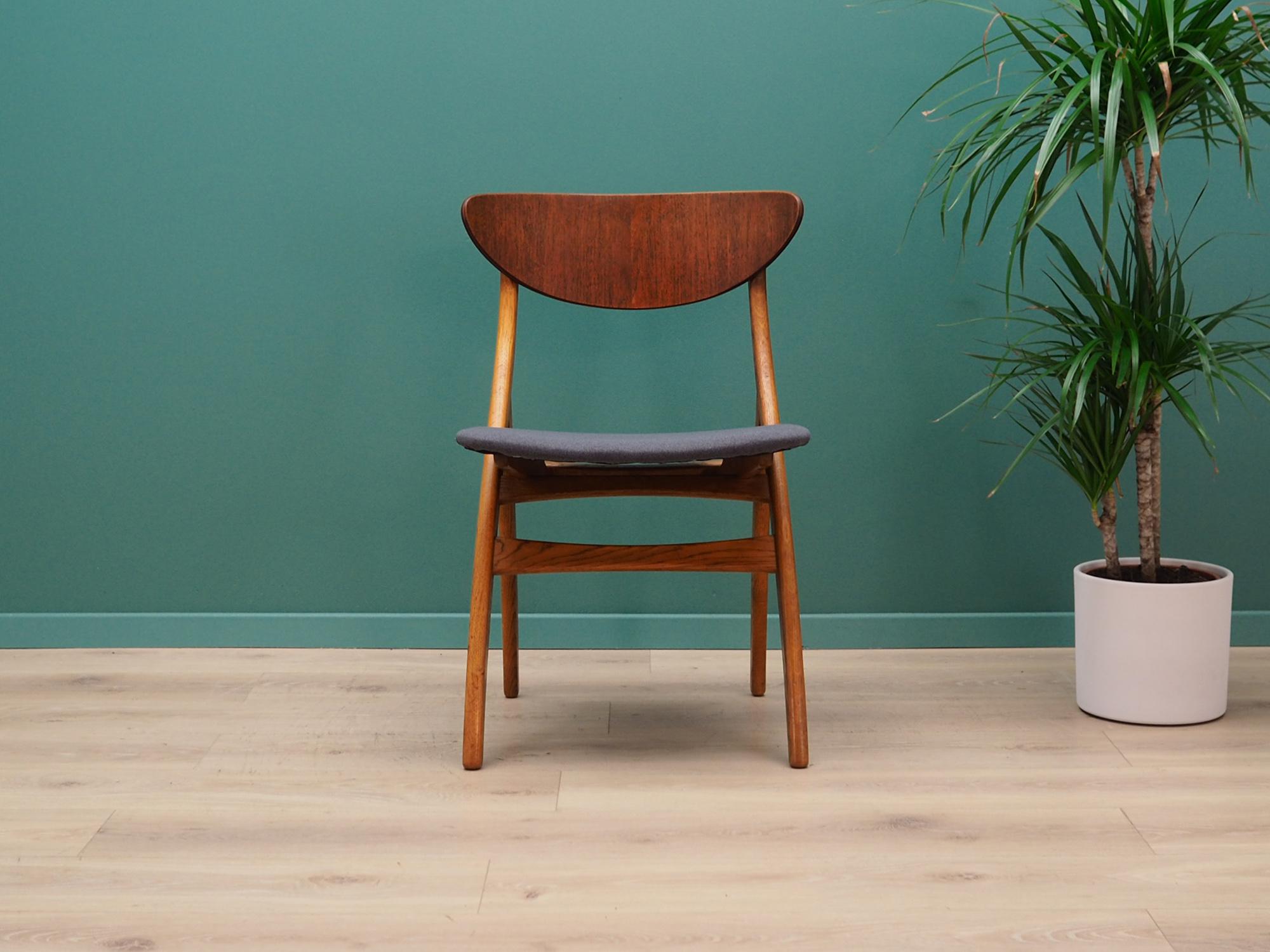Set of five classic chairs from the 1960s-1970s. Danish design, Minimalist form. Chairs are made of solid oak wood, backrest finished with teak veneer with seat covered with dark blue fabric. Preserved in good condition (minor bruises and scratches,