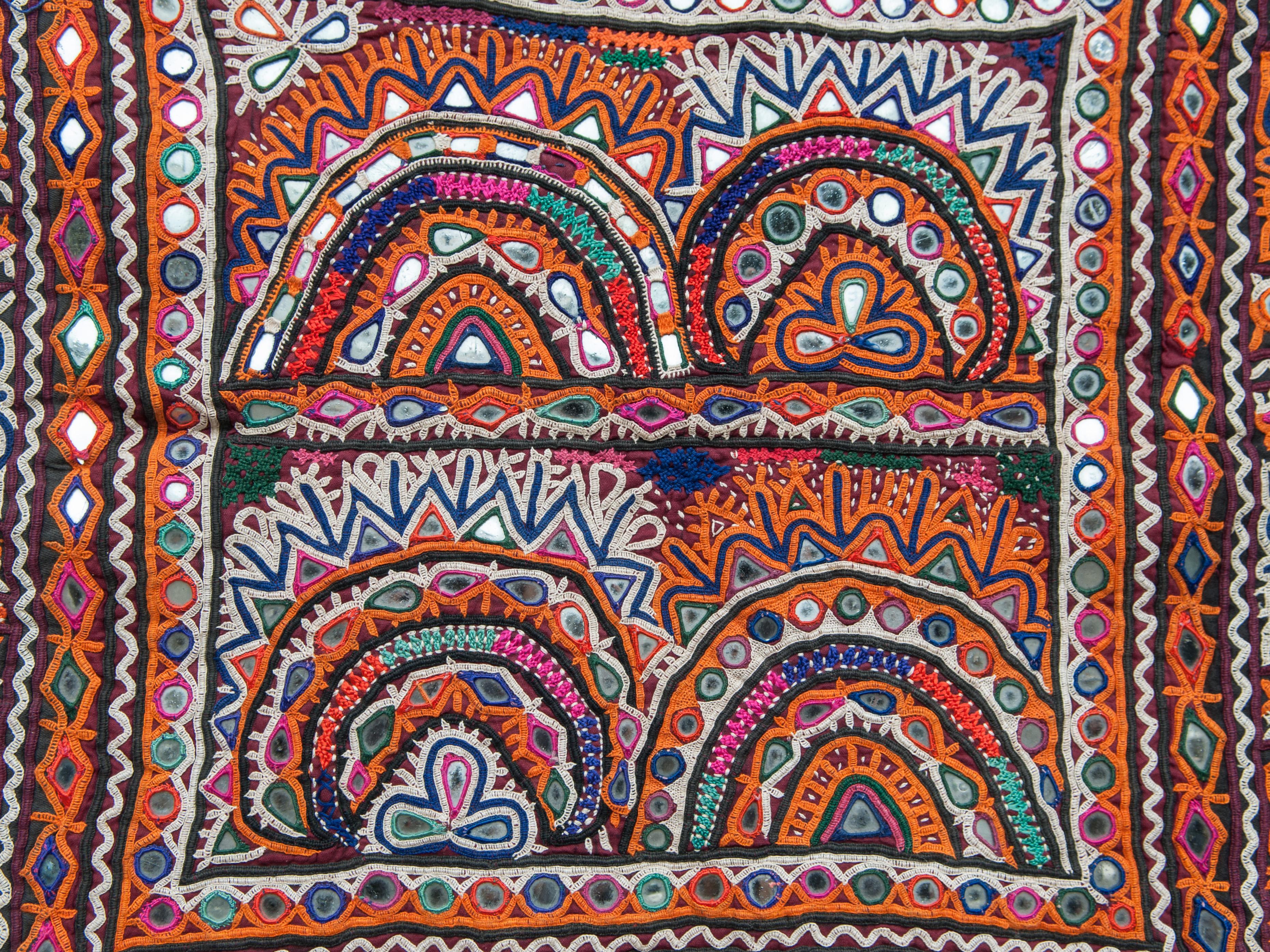 Vintage Chakla embroidered hanging, Rabari of Gujarat, India. Mid-20th century.
This finely worked hand embroidered textile comes from the Vaghadia Rabari, an ethnic group of pastoralists living in eastern Gujarat in India. It was used as a small