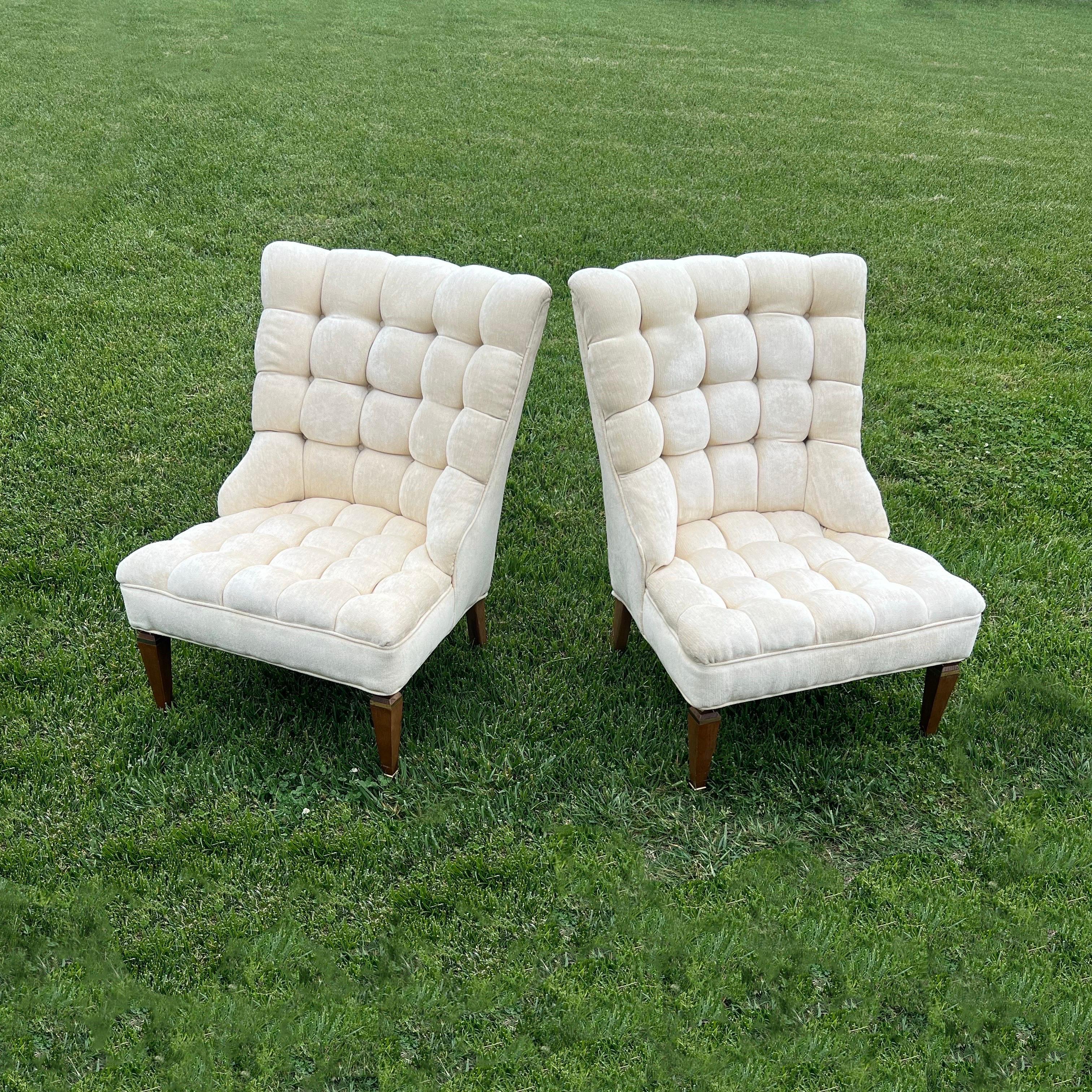 For your consideration, we are offering these wonderful vintage hollywood regency chairs in their origintal tufted velvet upolstery.. A gracefully designed and comfortable petite pair stand their ground on tapered legs, both footed and crowned with