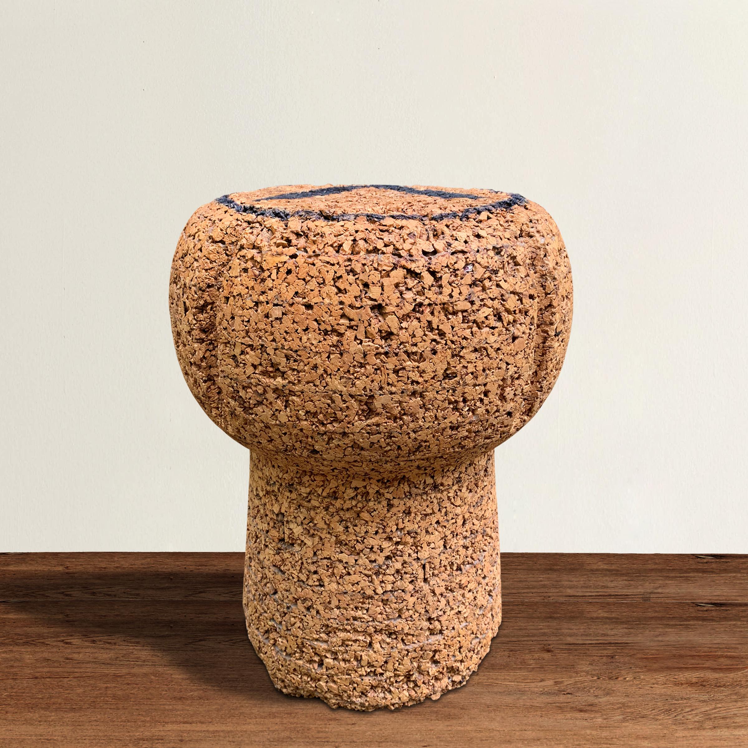 A whimsical vintage American Champagne cork stool or side table with a large 