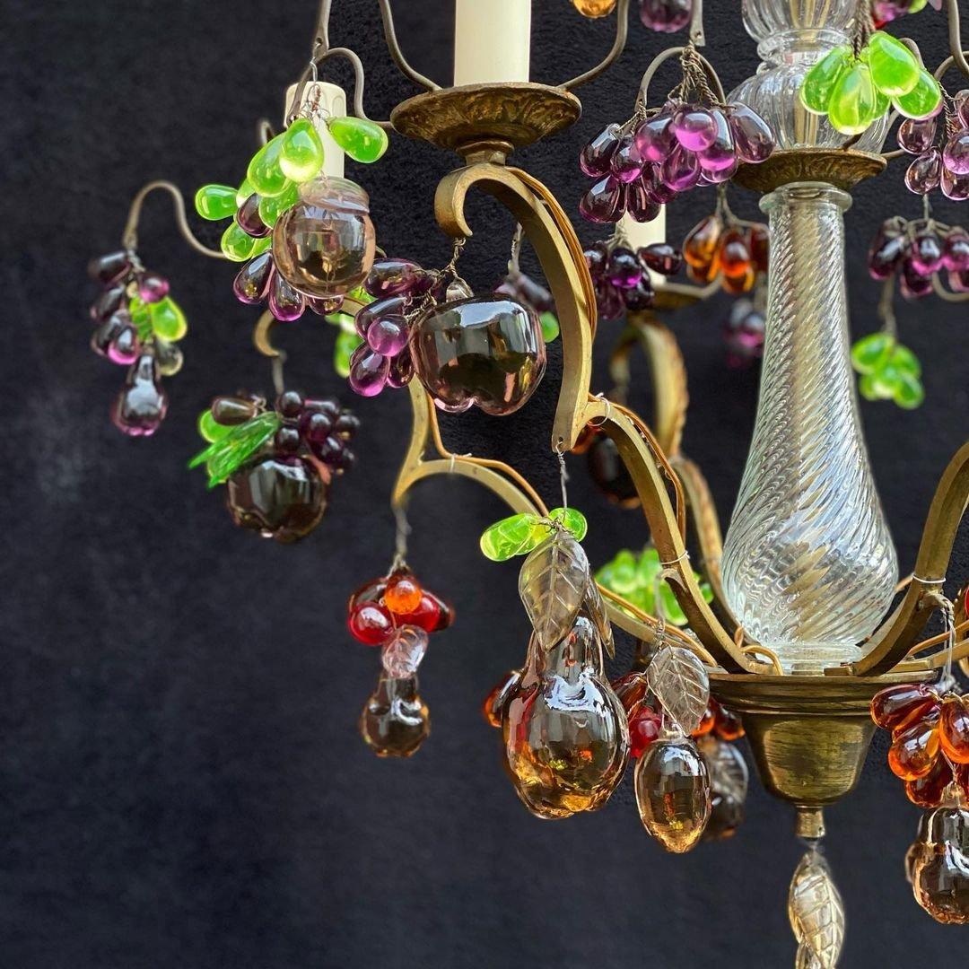 Antique Murano Glass Chandelier “Jardin”.

Exquisite Bronze Chandelier with Crystal Basic and Murano Glass Pendants.

1940’s.

Antique.

Made of Bronze, Crystal, Murano Glass.

Luxury Lighting for Unique Interior.

In perfect condition. No chips or