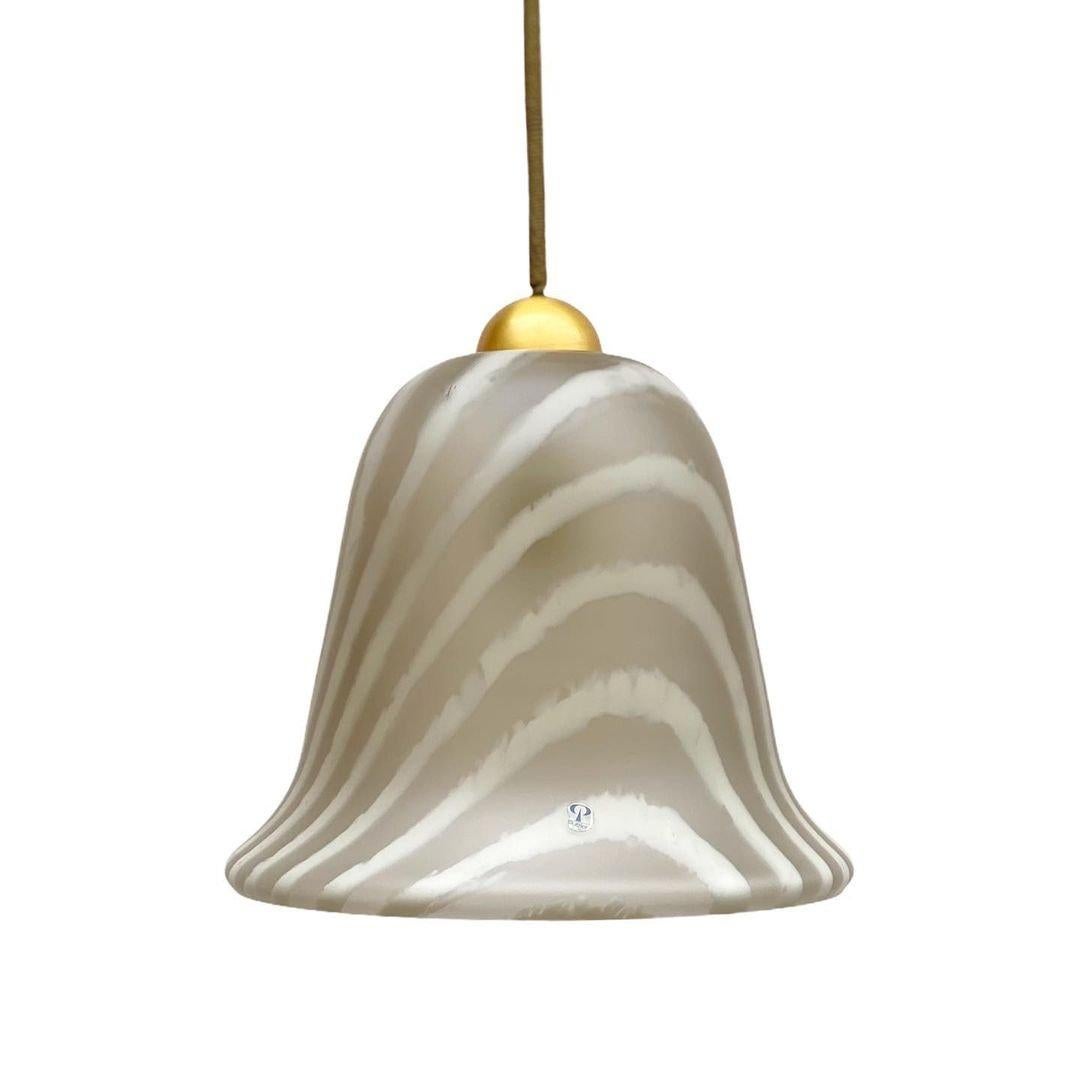 Vintage Stylish Chandelier From Peill & Putzle.

This Murano Glass Pendant lamp fits in almost everywhere and spread its light with joy. Hang it from the ceiling in the kitchen, in a corner of the living room, or in the hallway, and it will