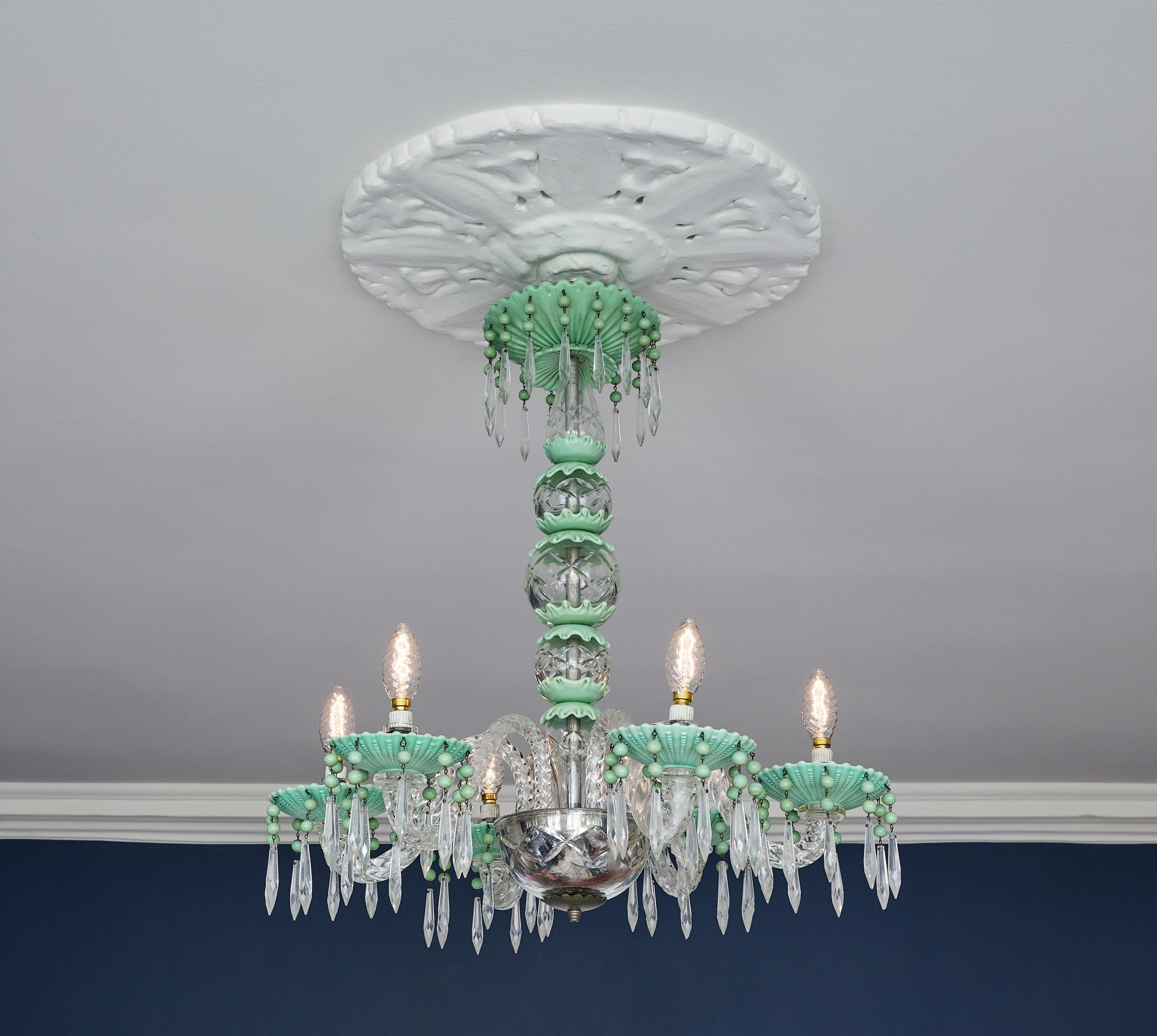 Italy, 1940s

Chandelier in pale green and clear glass. 

Measures: H 60 x Ø 60 cm.