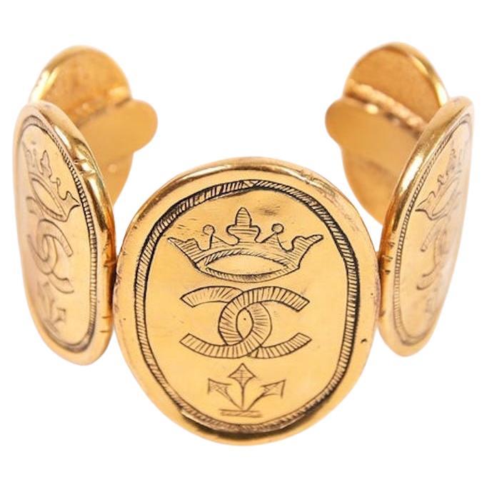 Vintage Chanel 1987 Coin Cuff Bracelet in 24k Gold Plate w/Crown & CC Logo Motif For Sale