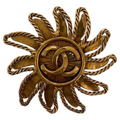 Vintage Chanel 1994 Sun Brooch Pin with Interlocking CCs