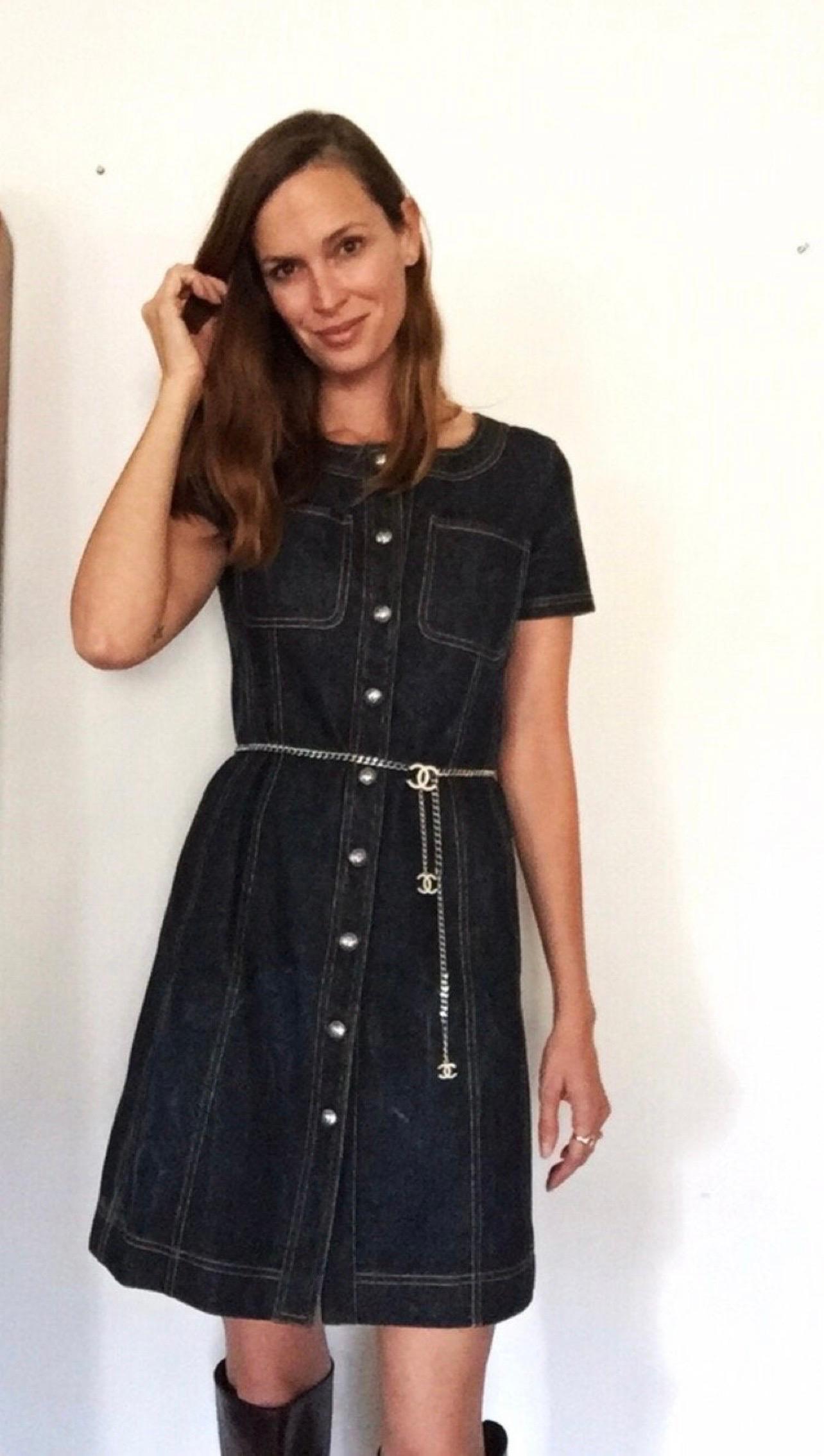🖤Classy and Gorgeous!🖤

You will be the chicest of the chic in this vintage Chanel beauty!

CC logos on Silver Buttons adorn the whole front portion of this dress. 
The cut is absolute perfection! 
Stitching is perfect, and the denim is thick high