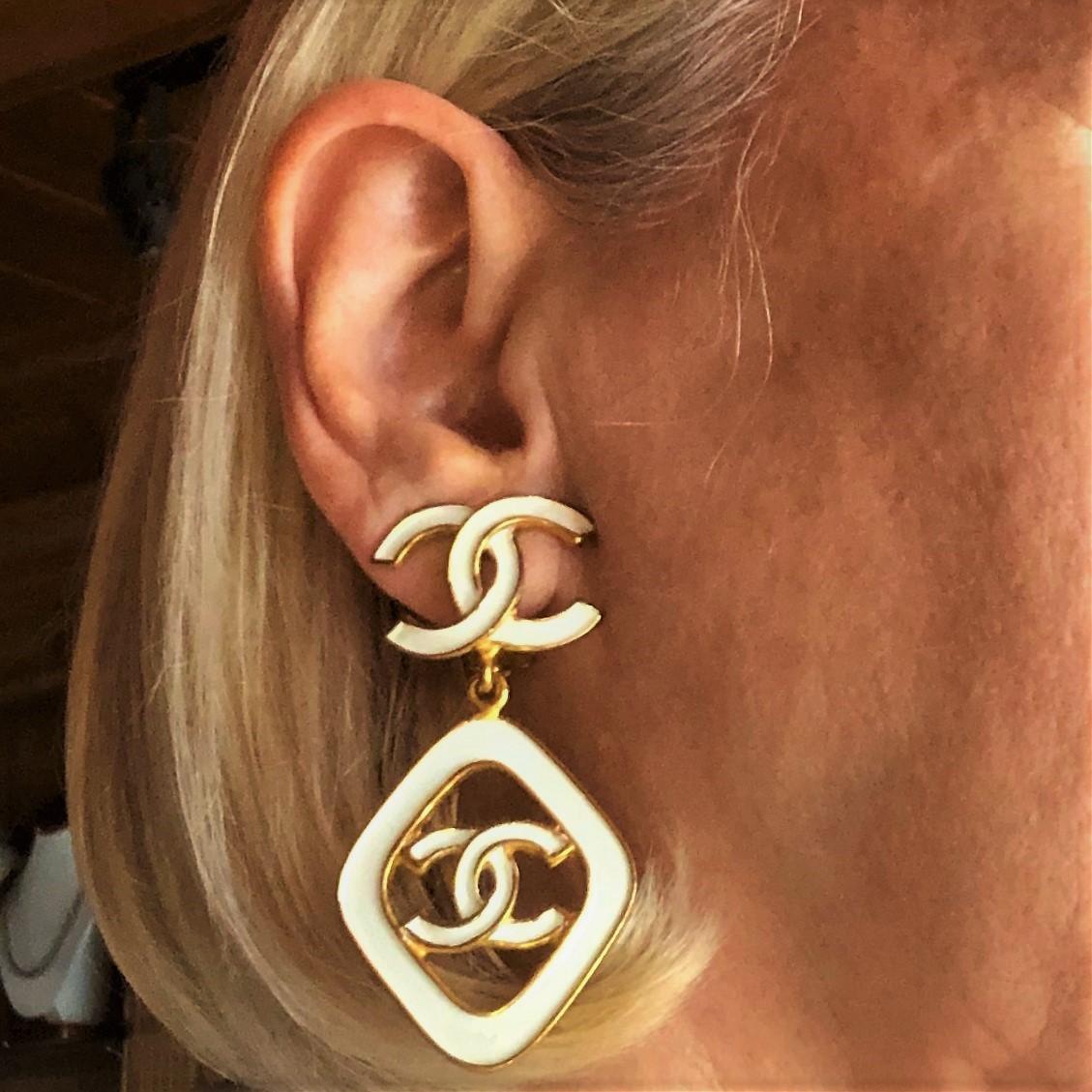 Vintage Chanel 2.5 Inches Long White Enamel on Gold Tone Metal Earrings In Good Condition In Palm Beach, FL