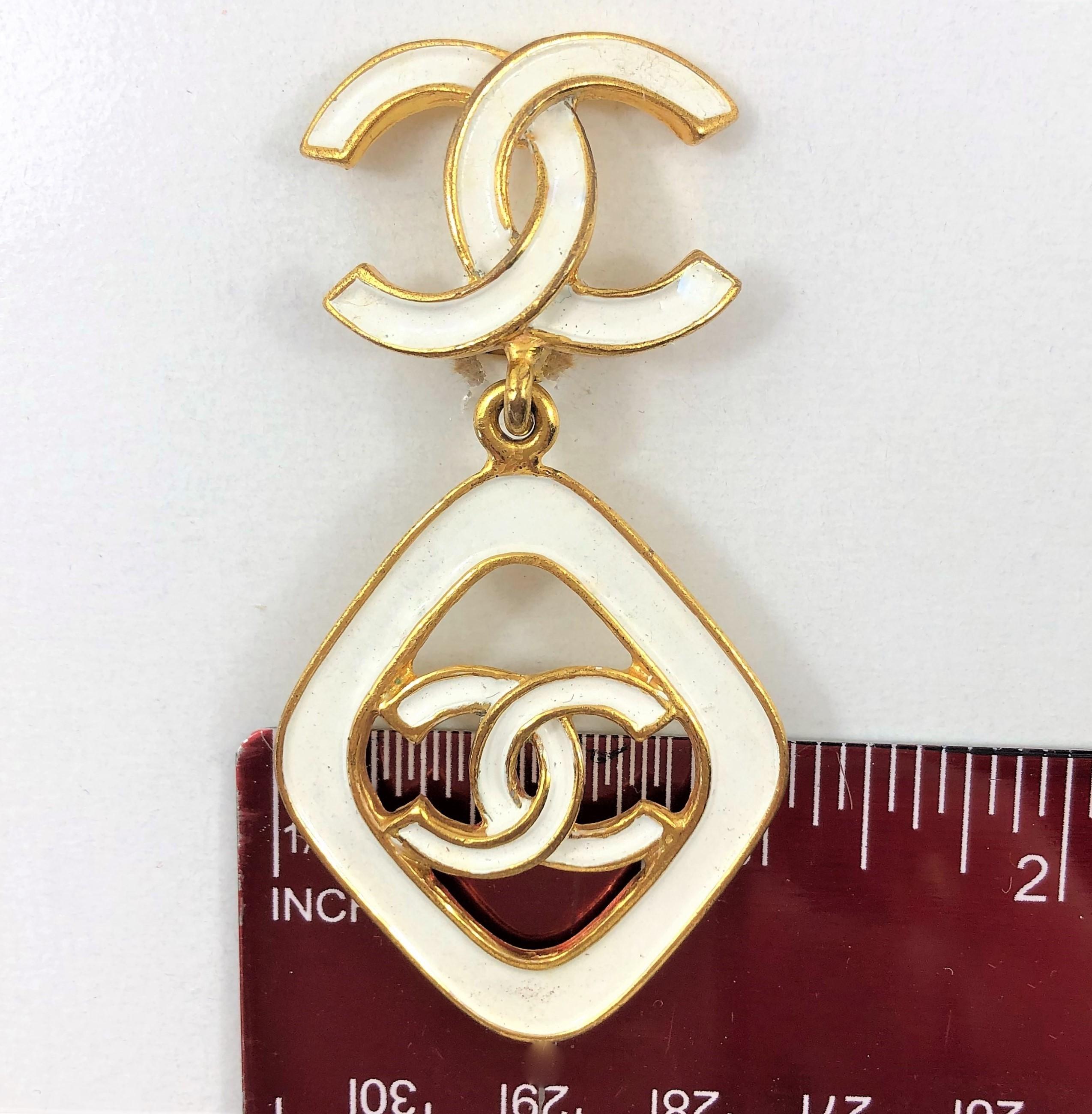 Vintage Chanel 2.5 Inches Long White Enamel on Gold Tone Metal Earrings 1