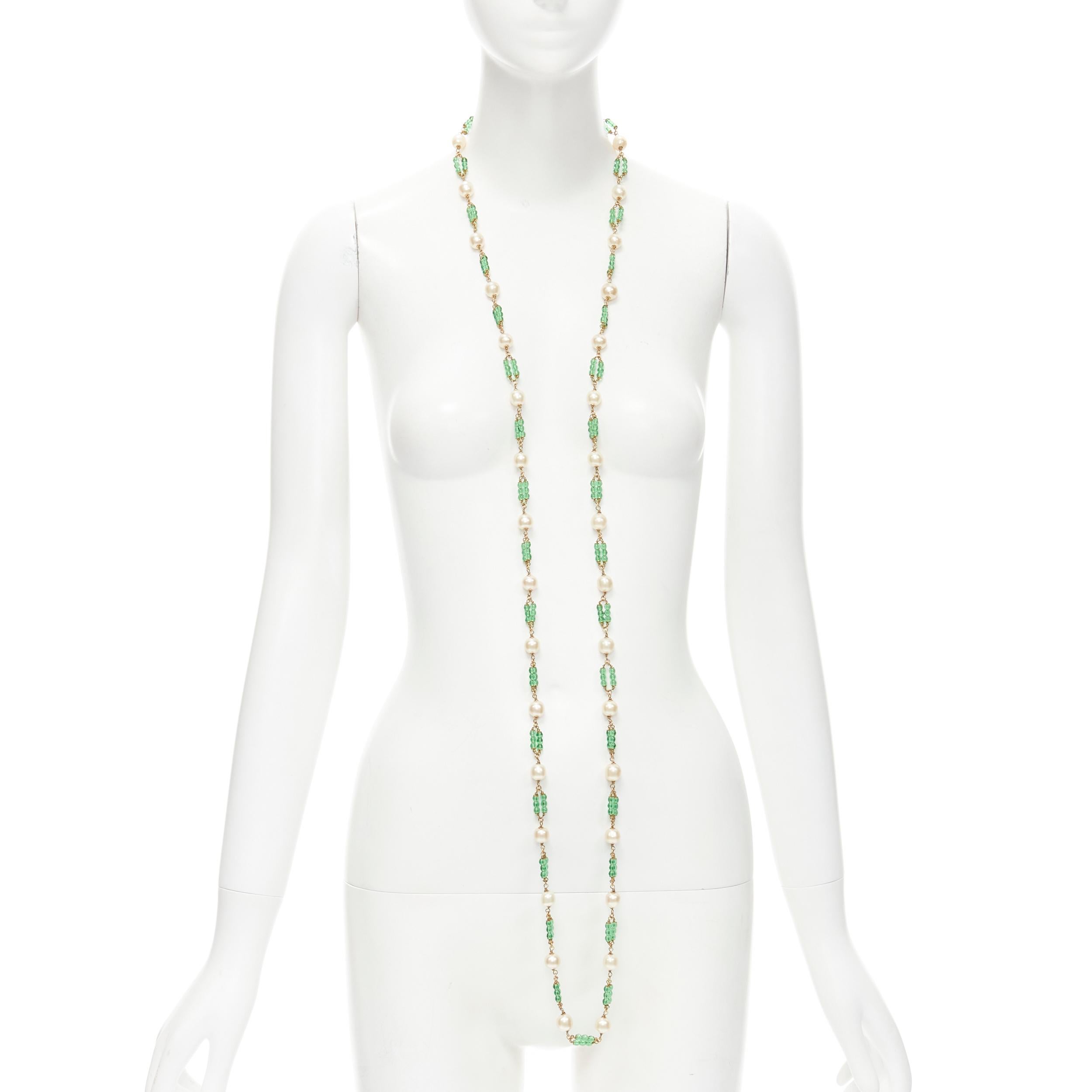 vintage CHANEL 93A green Gripoix poured glass beads faux Pearl sautoir necklace
Brand: Chanel
Designer: Karl Lagerfeld
Collection: 93A 
Material: Metal
Color: Gold
Pattern: Solid
Closure: Lobster Clasp
Extra Detail: Gold-tone metal chain. Faux pearl