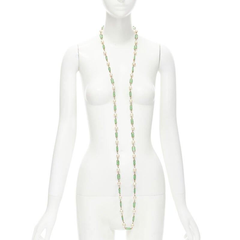 vintage CHANEL 93A green Gripoix poured glass beads faux Pearl sautoir necklace
Reference: BMPA/A00148
Brand: Chanel
Designer: Karl Lagerfeld
Collection: 93A
Material: Metal, Gripoix
Color: Gold, Green
Pattern: Solid
Closure: Lobster Clasp
Extra