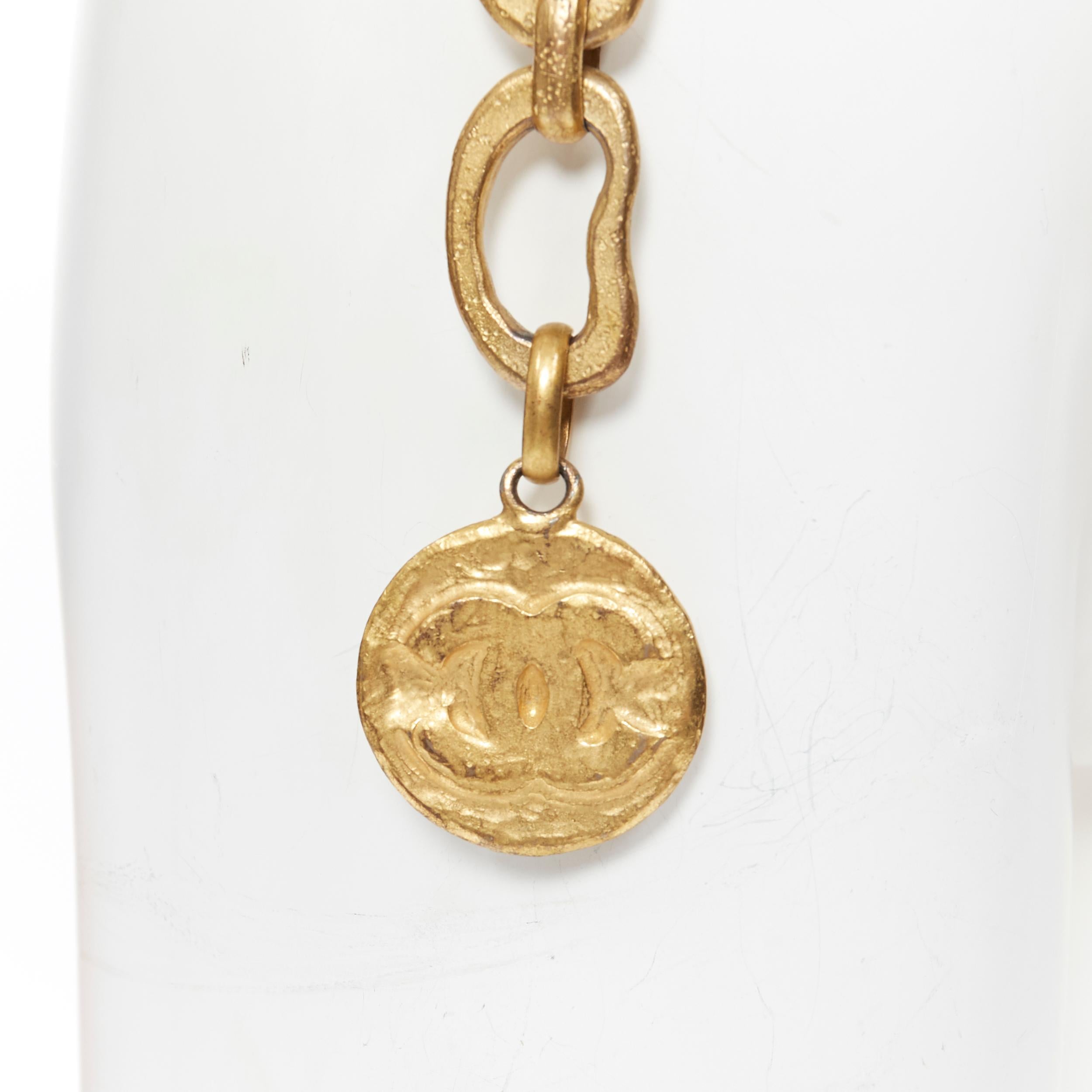 Women's vintage CHANEL 93P antique gold tone metal looped dual chain CC medallion belt