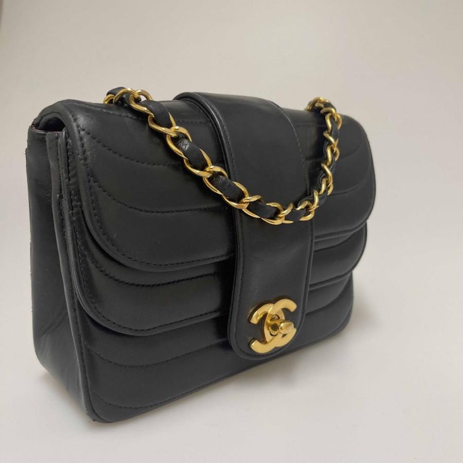 Women's or Men's Vintage CHANEL bag black leather