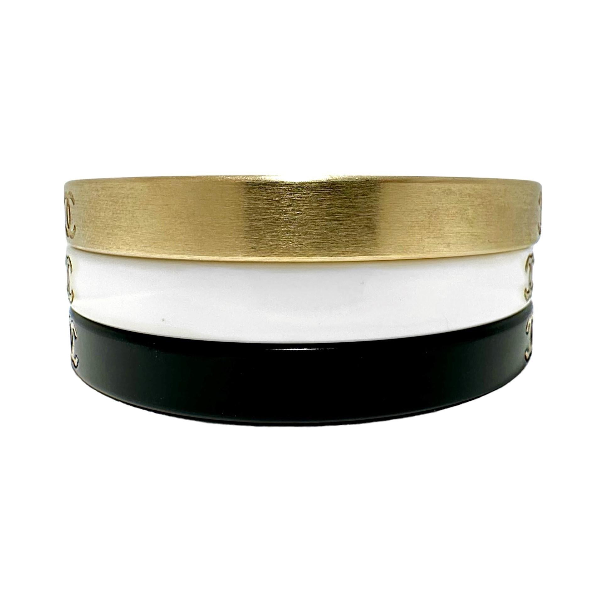 Modern Vintage Chanel Bangle Set of 3: In Gold Tone, White, & Black Resin With CC Logo  For Sale